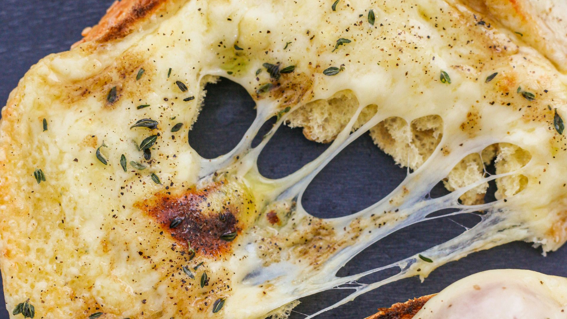 pizza with cheese and green vegetable