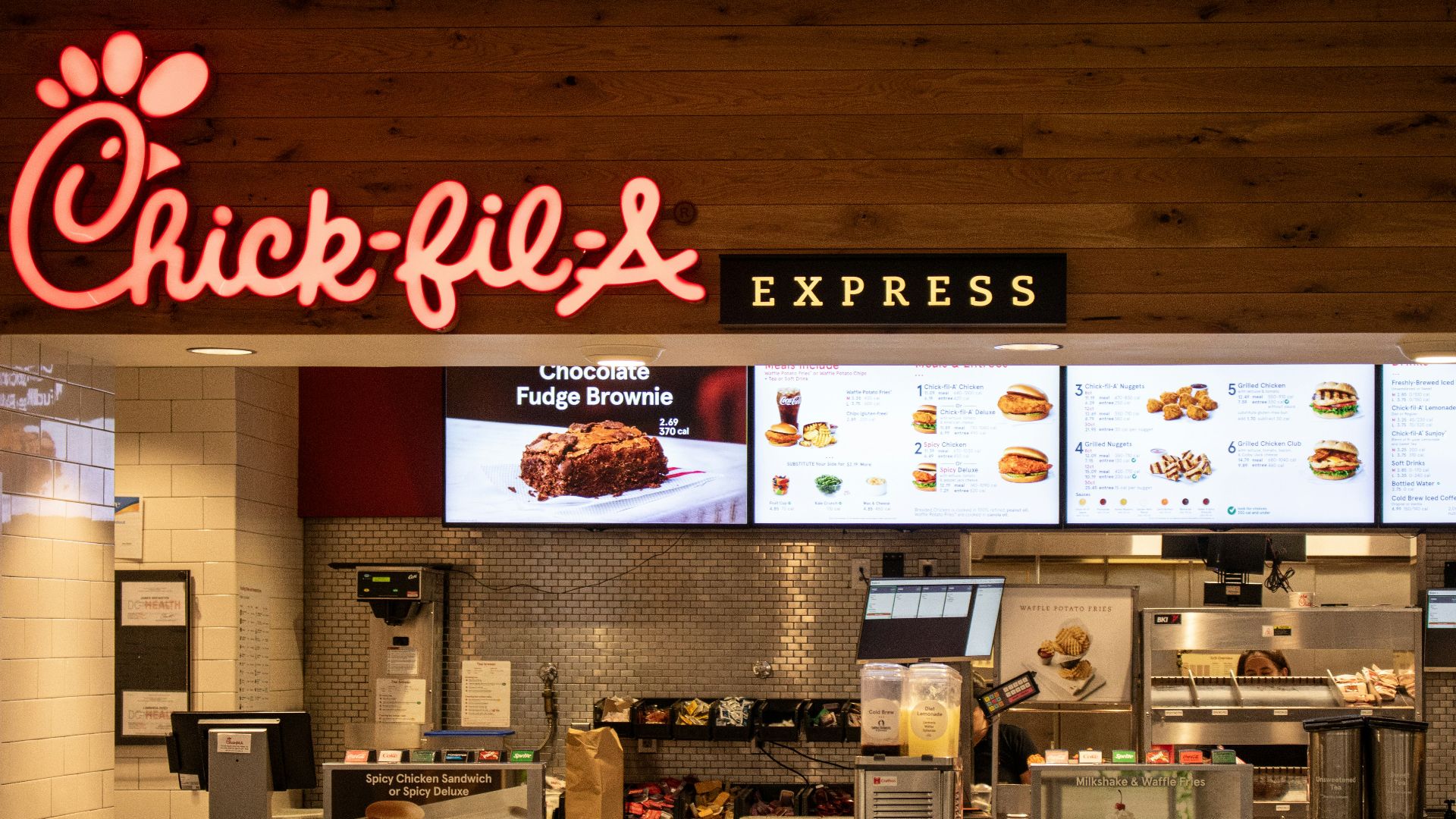 a fast food restaurant with a large menu