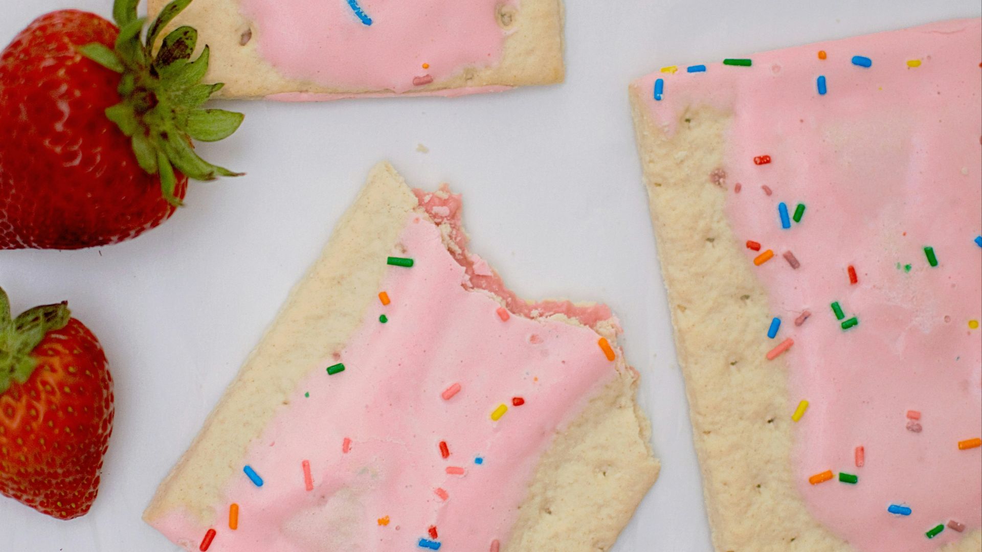 strawberries on white surface