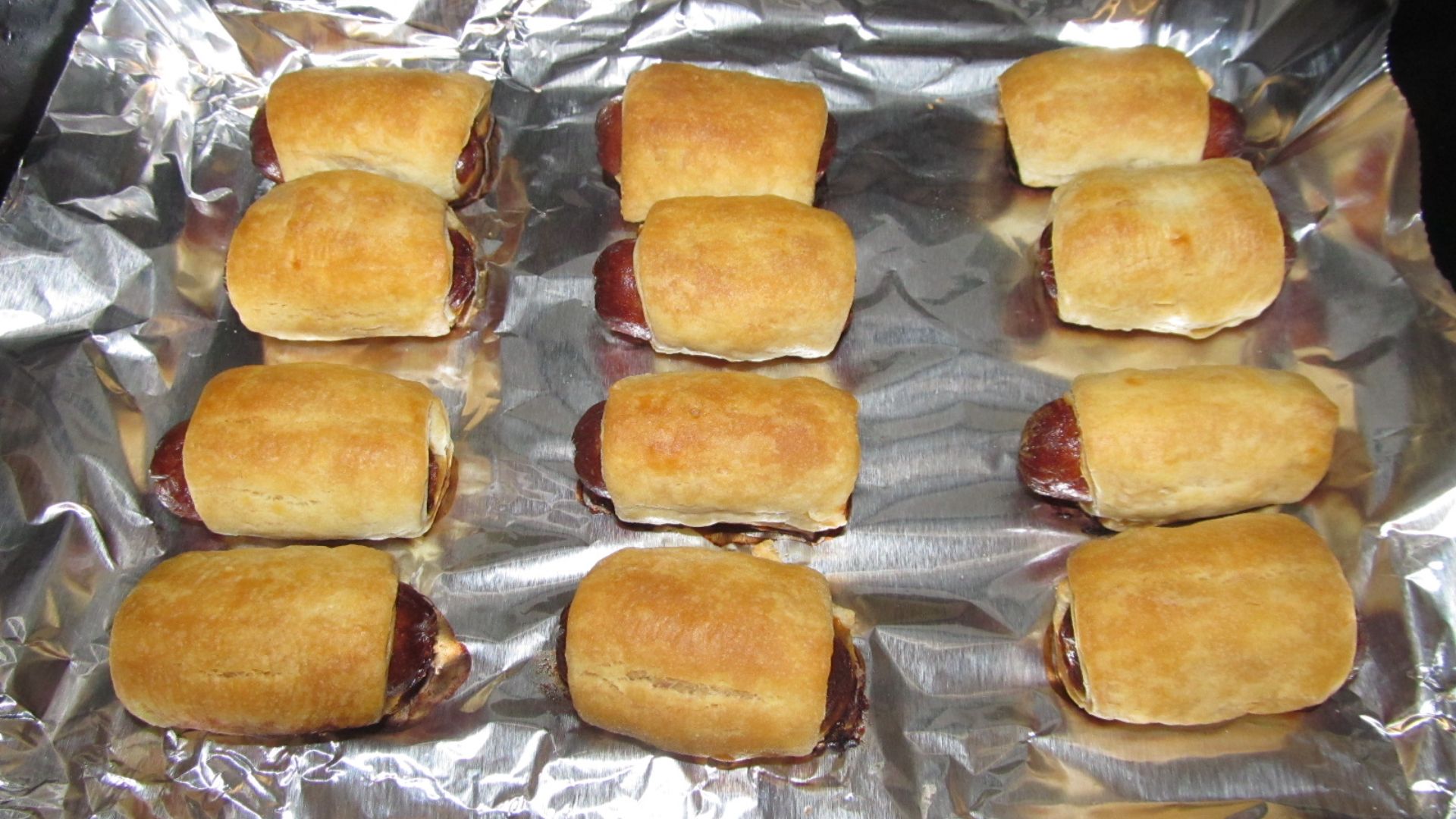 File:Nathan's Beef Franks in a Blanket out of oven (34095719402).jpg