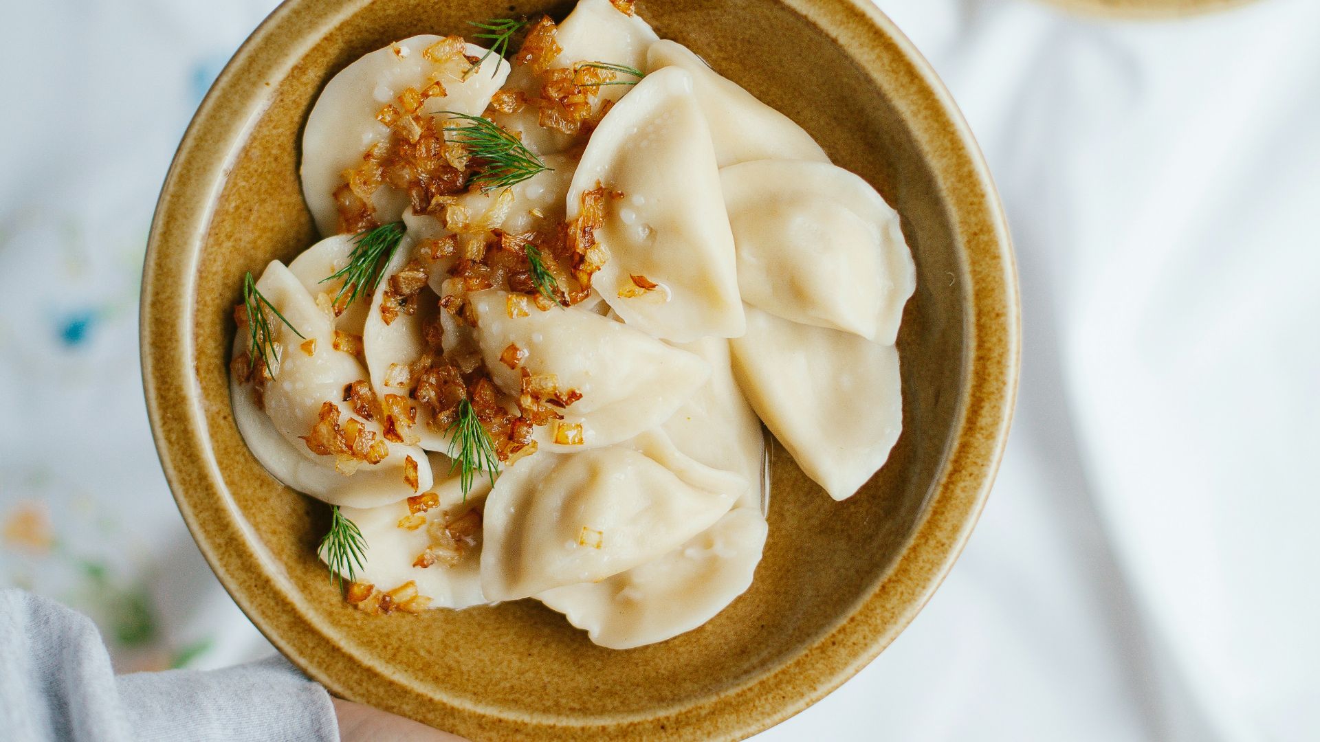 white cream on brown round bowl