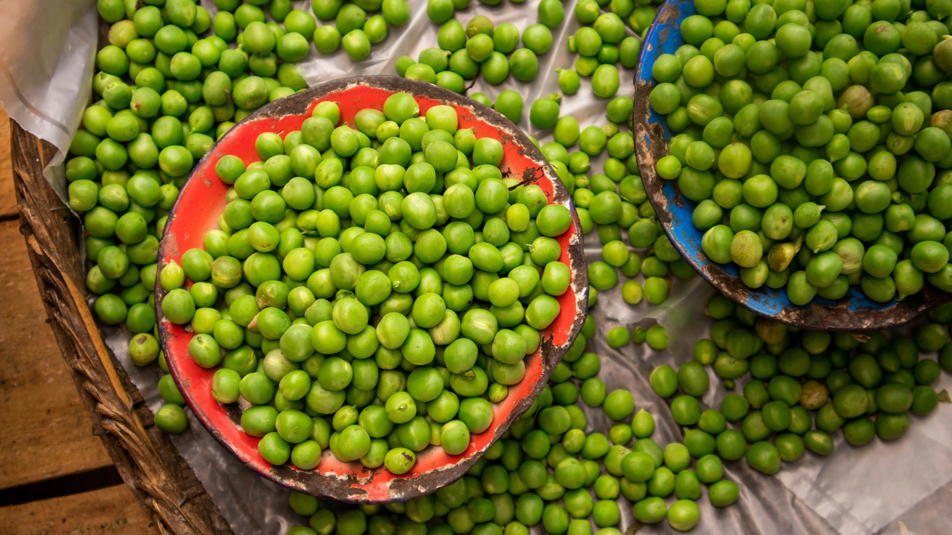 a group of baskets full of green grapes