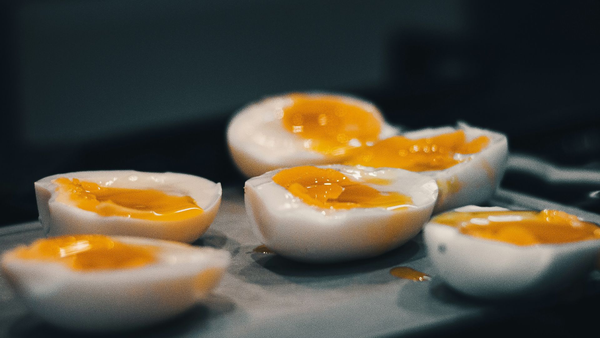 hard boiled eggs are sitting on a tray