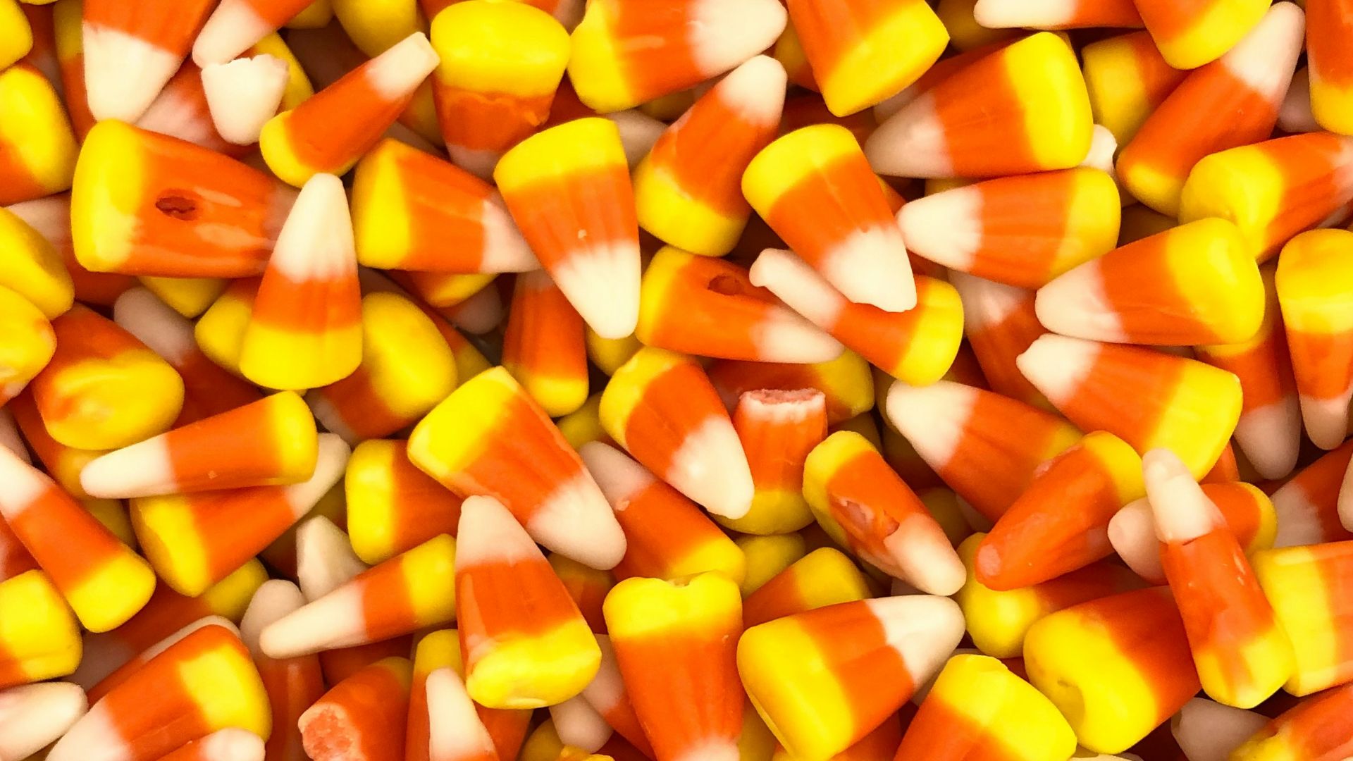 a large pile of candy corn is shown