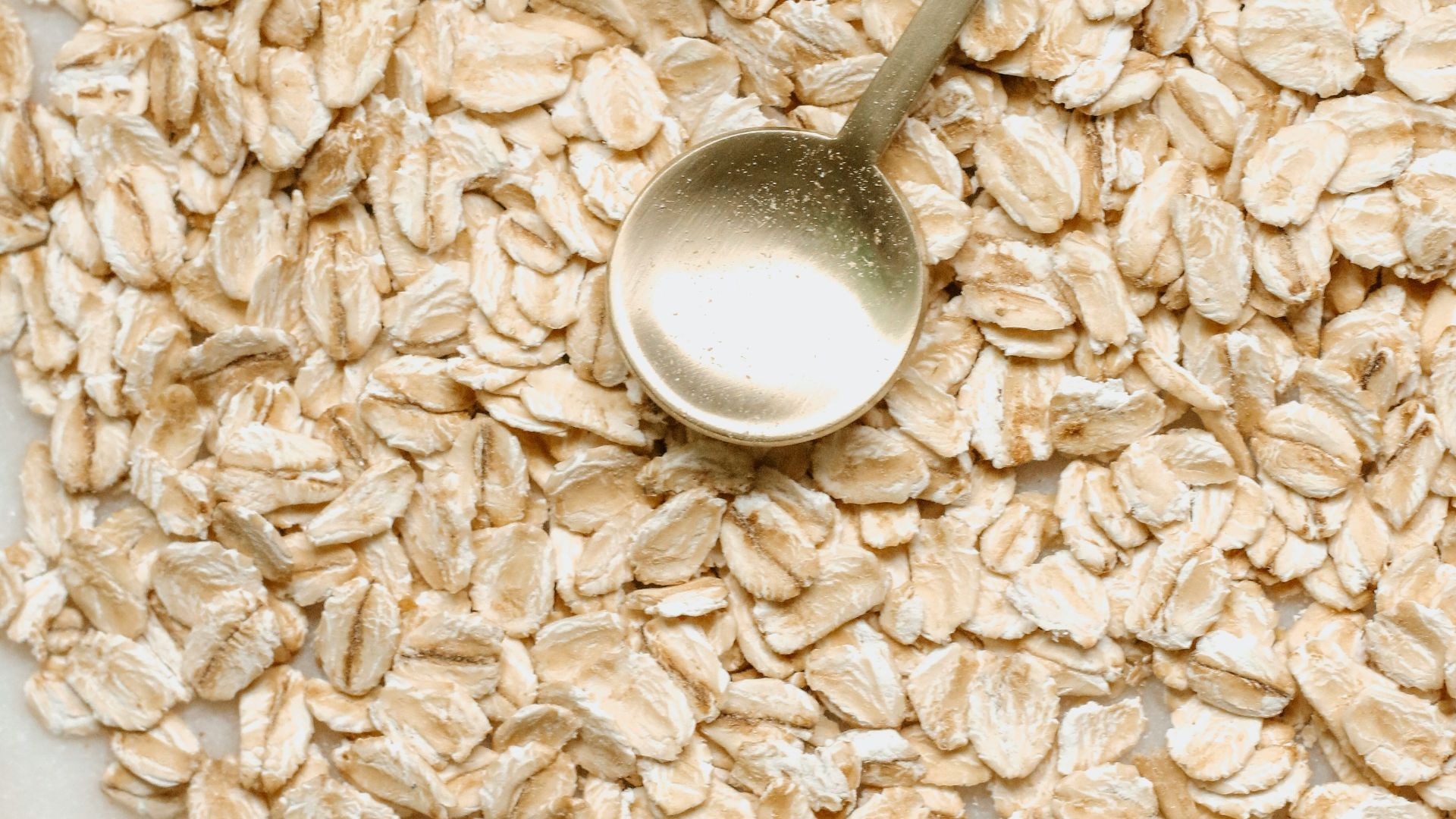 silver spoon on white rice