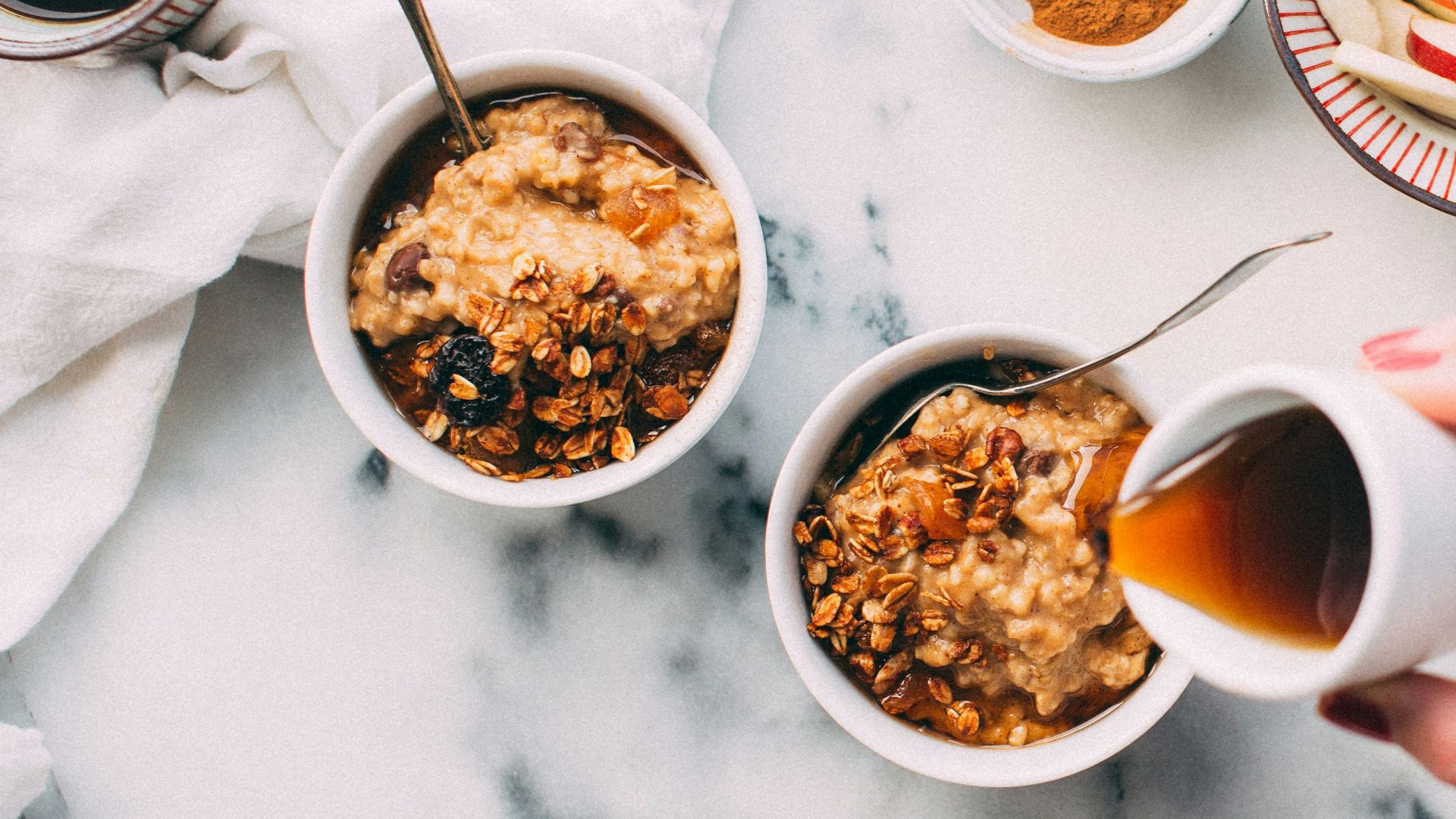 person holding white ceramic cup