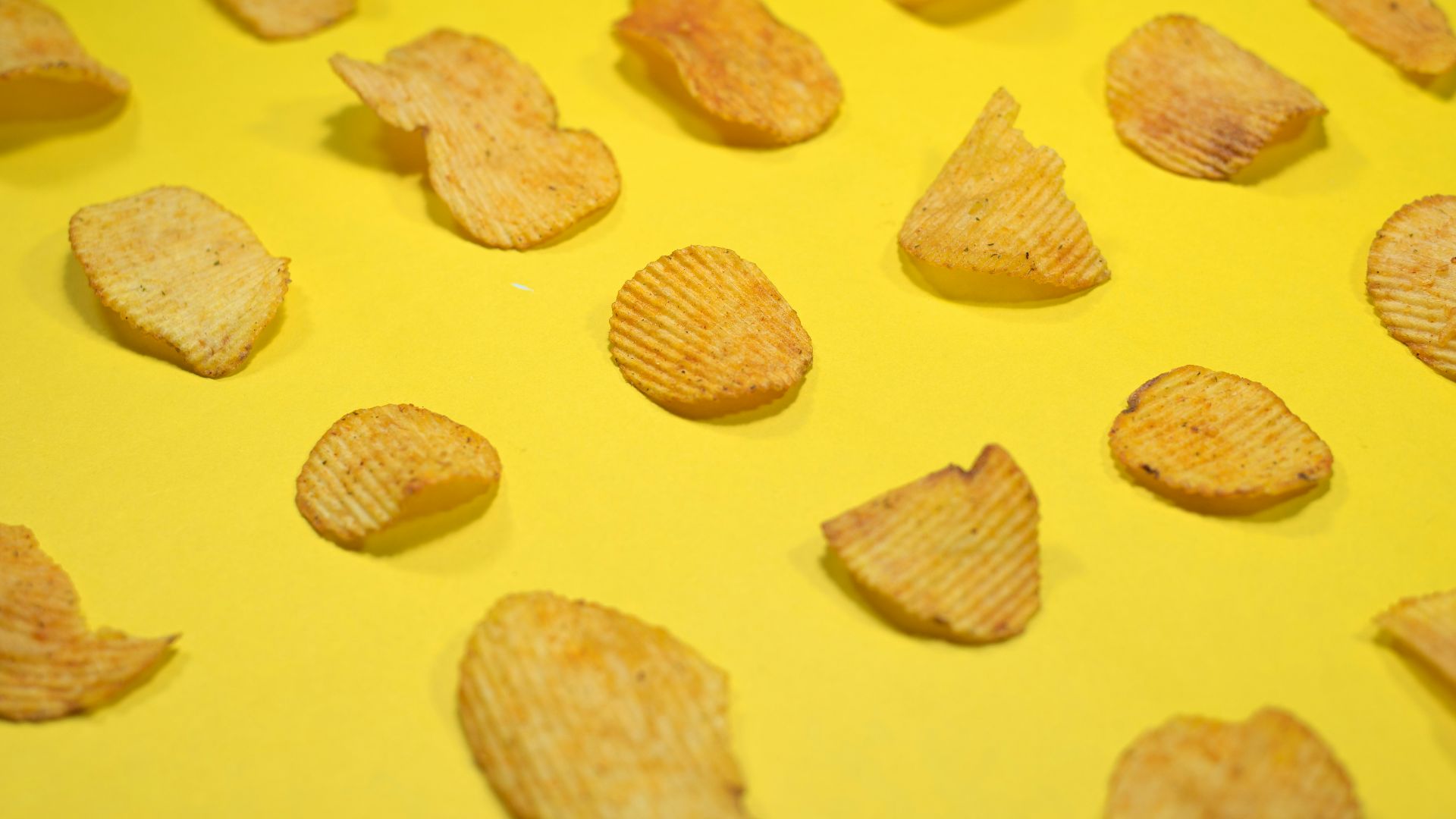 brown cookies on yellow surface
