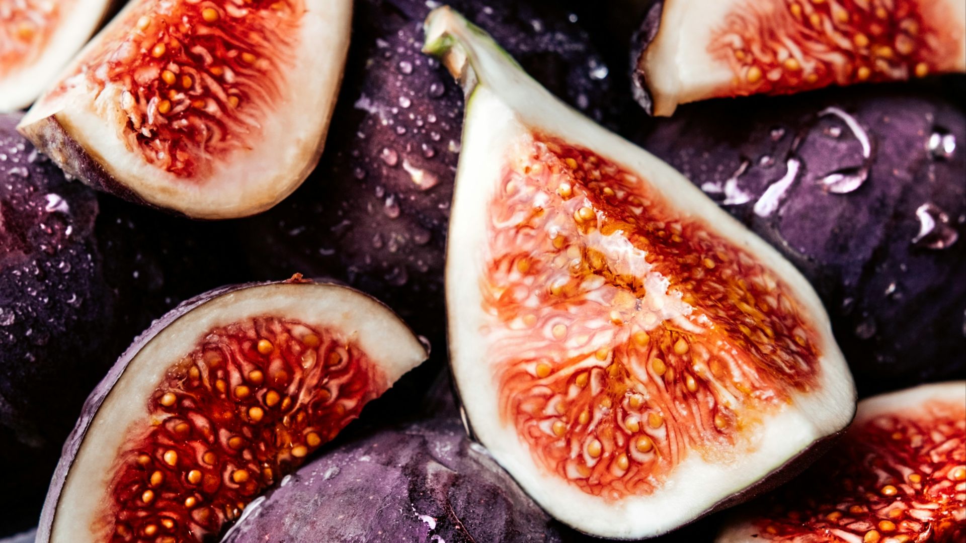 a bunch of figs that are sitting on a table