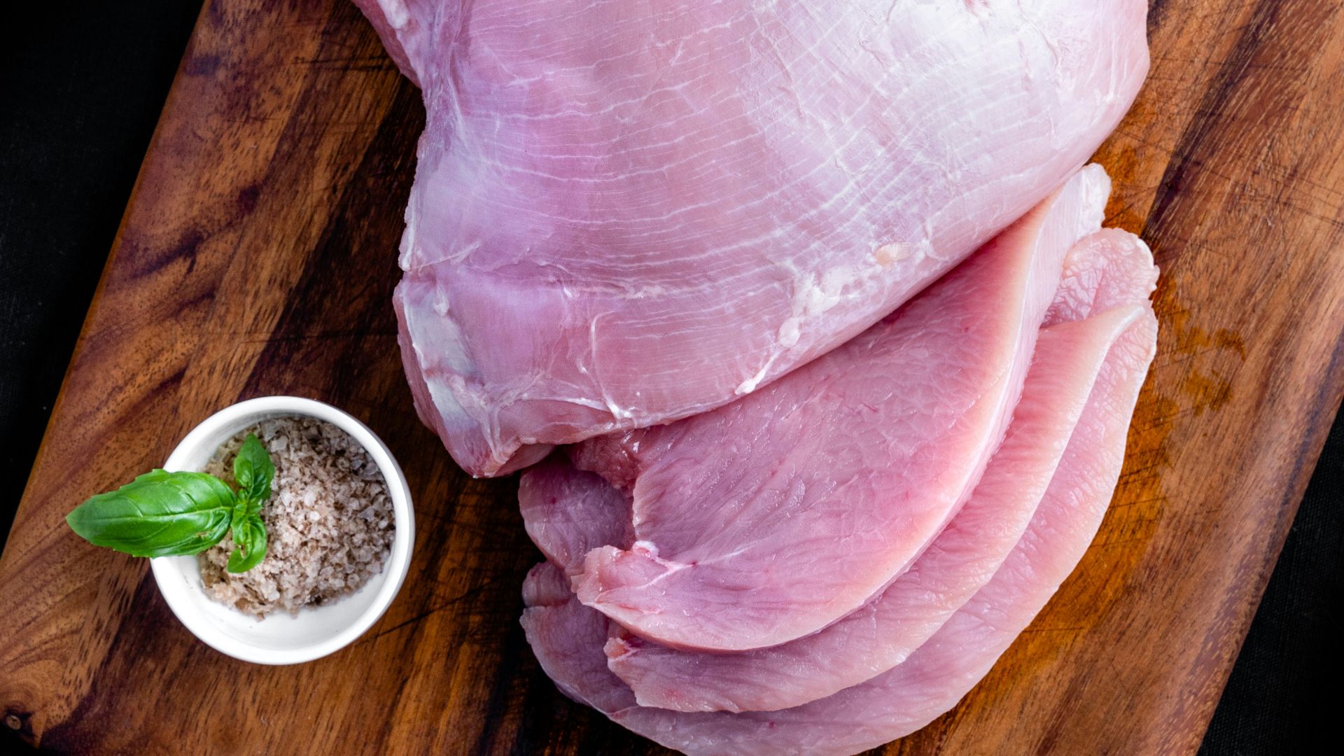 raw meat on brown wooden table