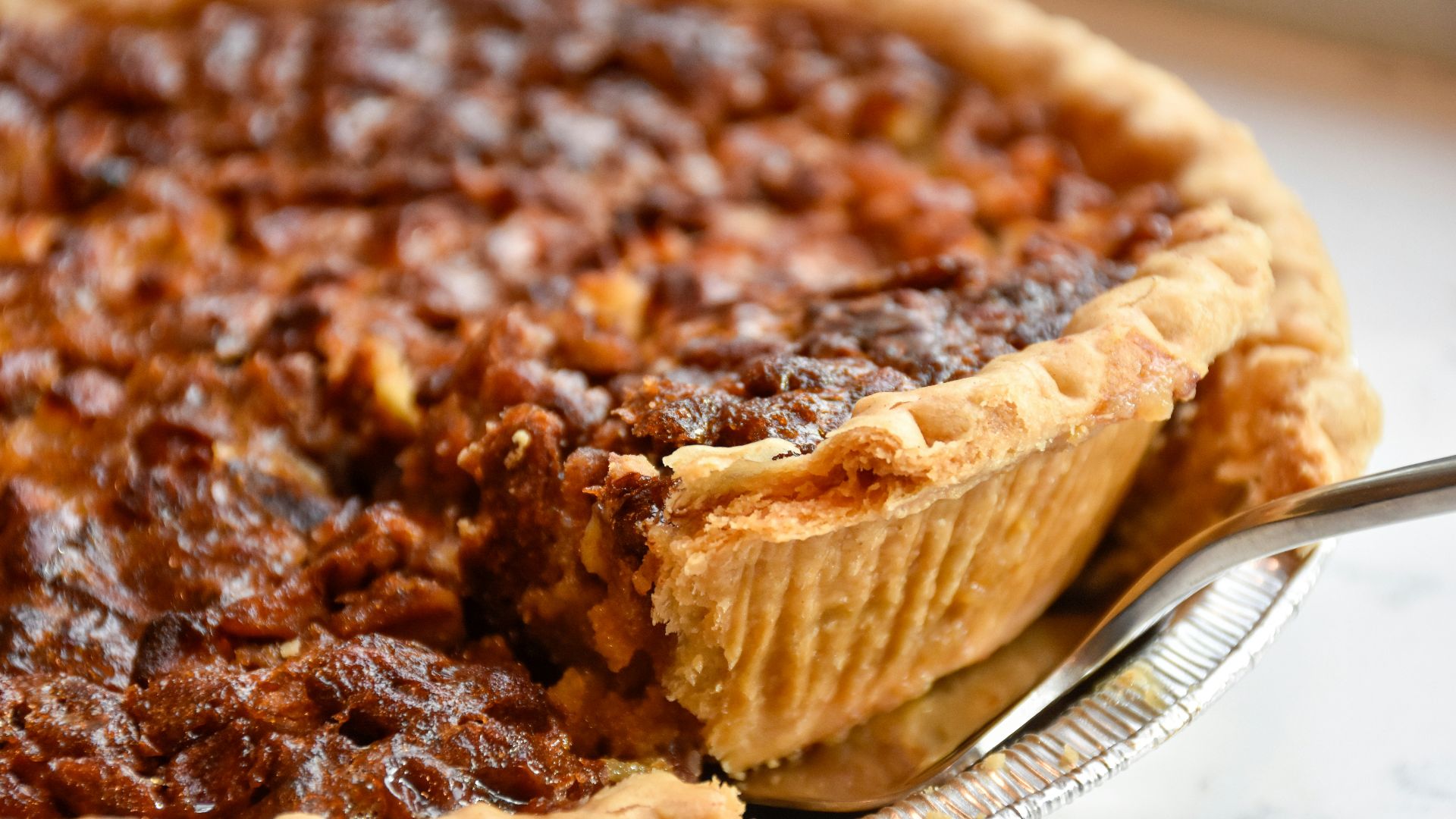 brown pie on white ceramic plate