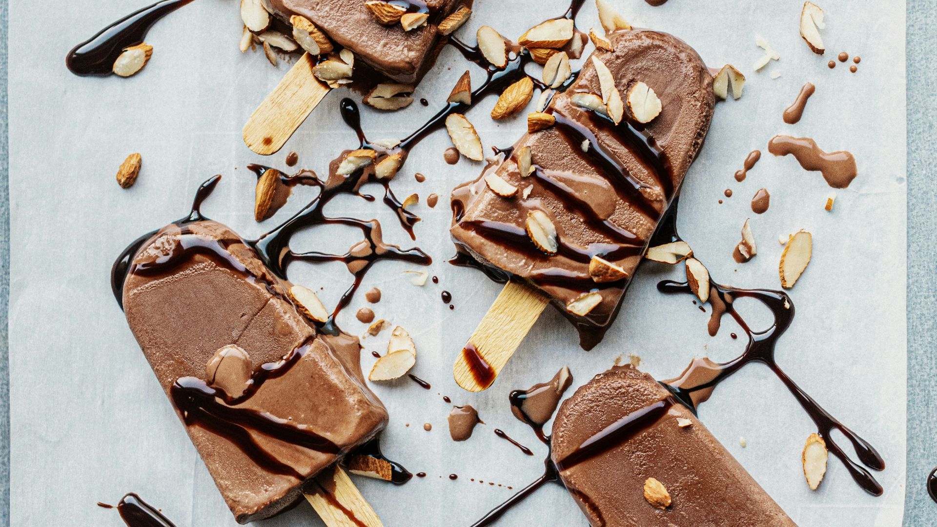 brown wooden cross with black metal frame