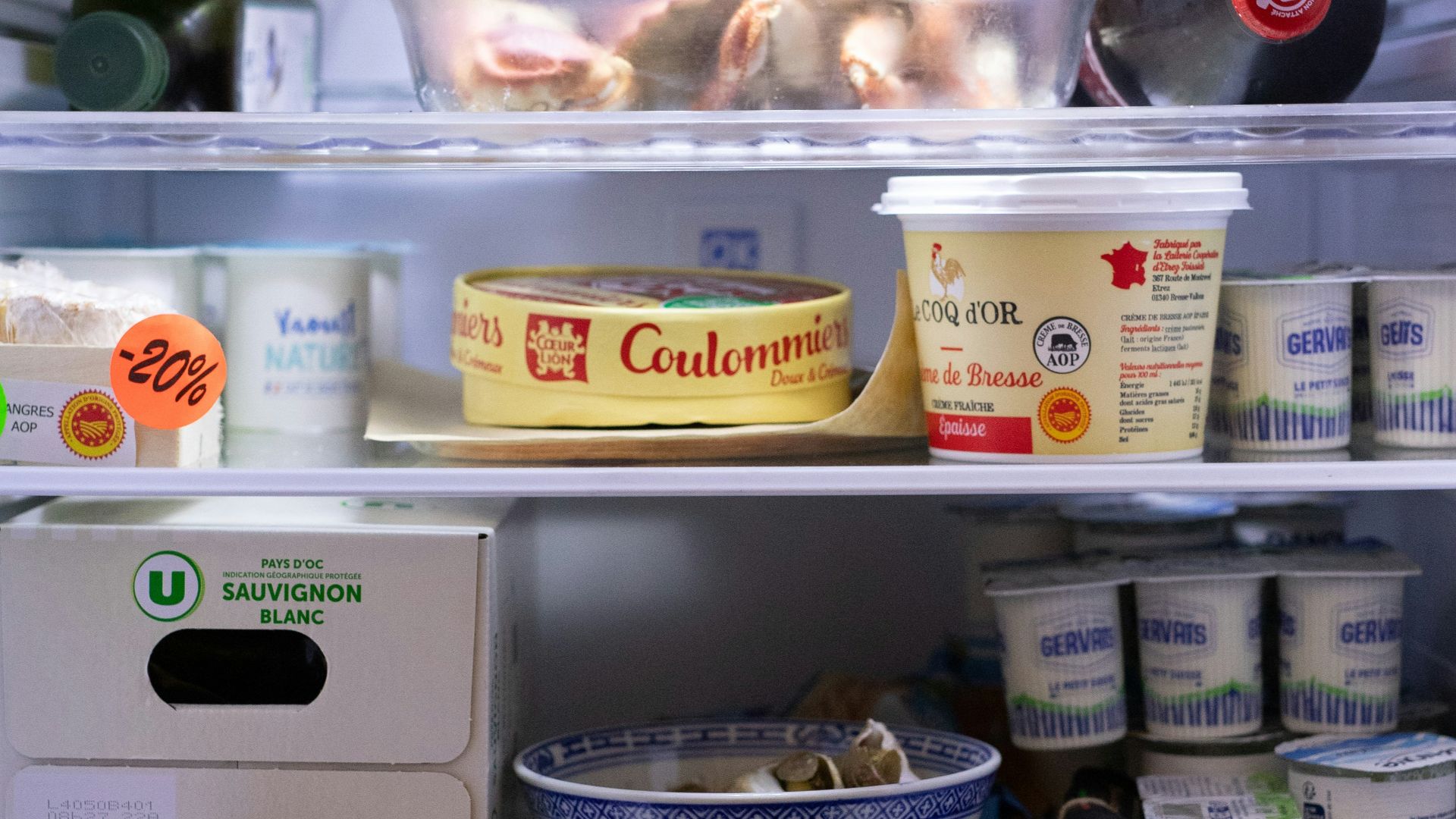 an open refrigerator filled with lots of food