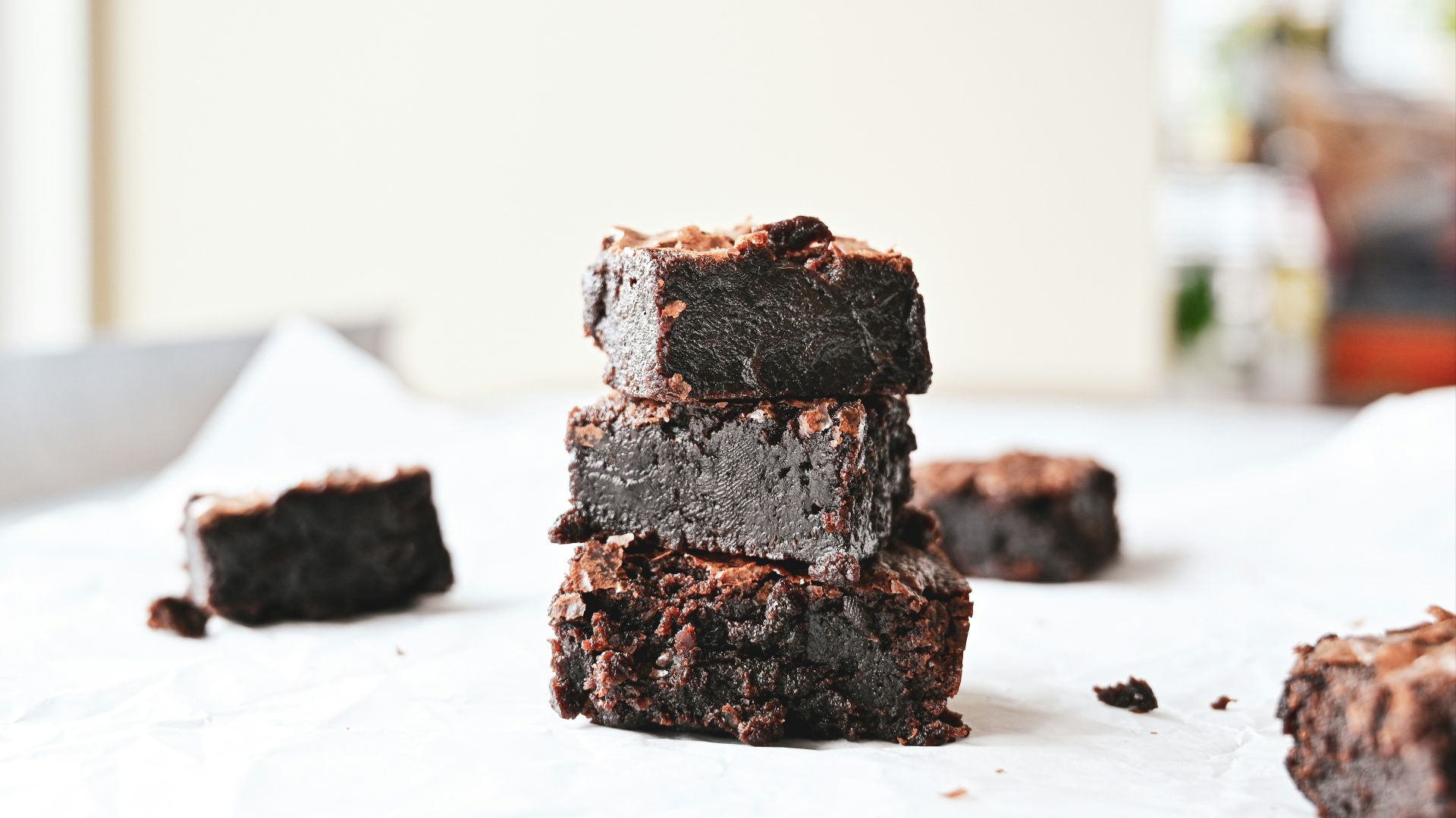 brown and black chocolate cake on white table