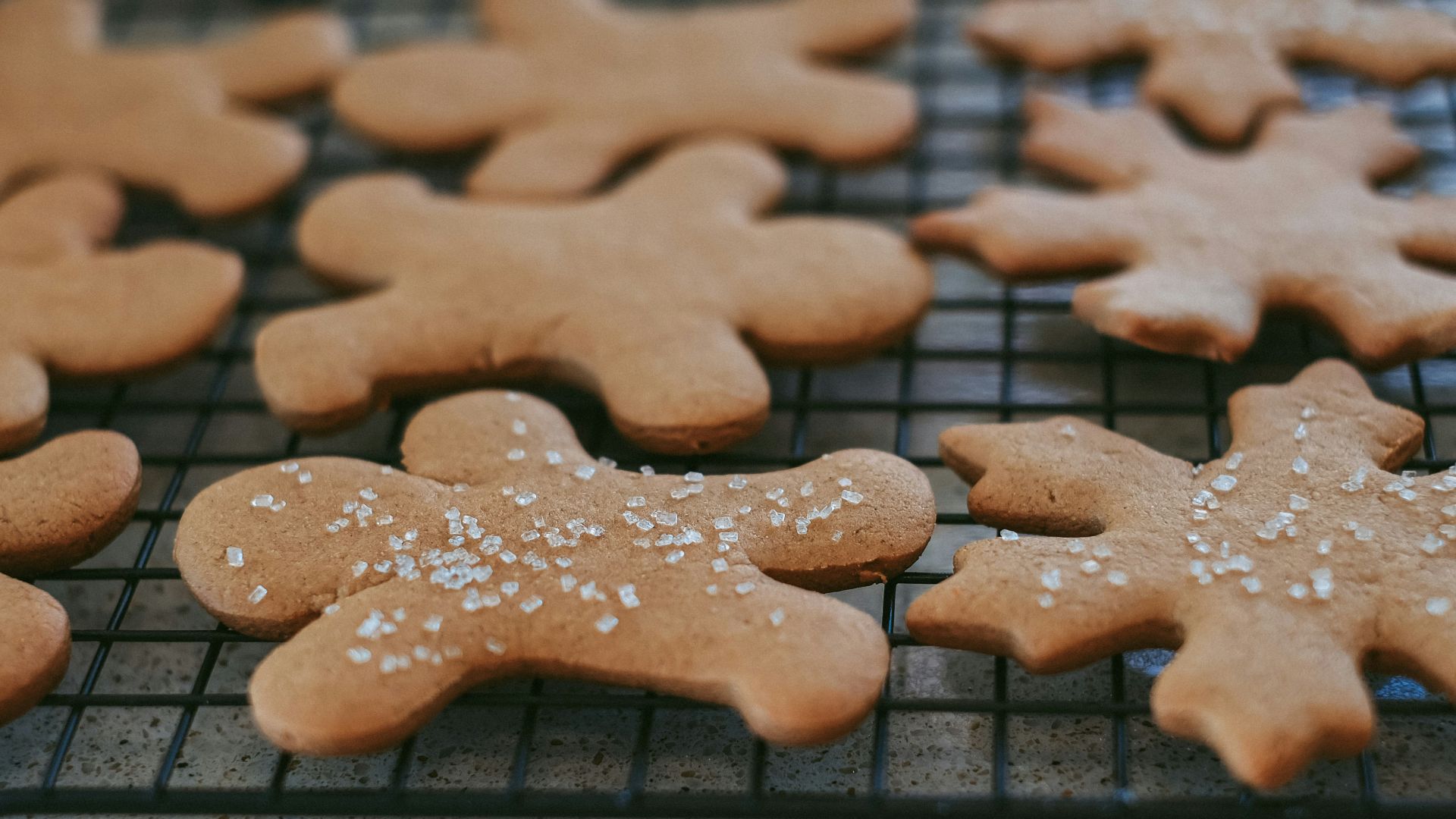brown heart shaped cookie on black metal frame