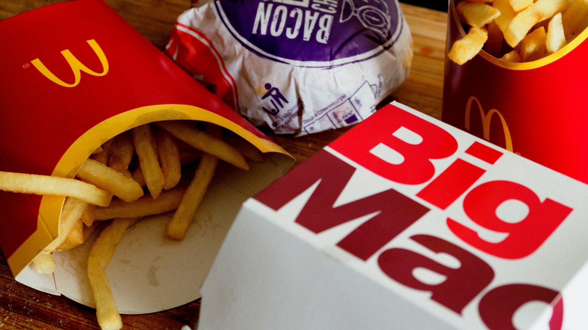 a sandwich sitting on top of a wooden table