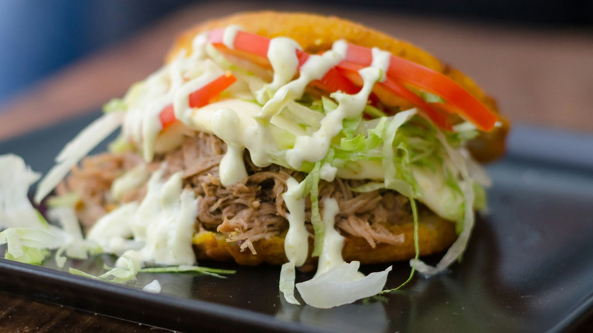 brown and white dish on black rectangular tray