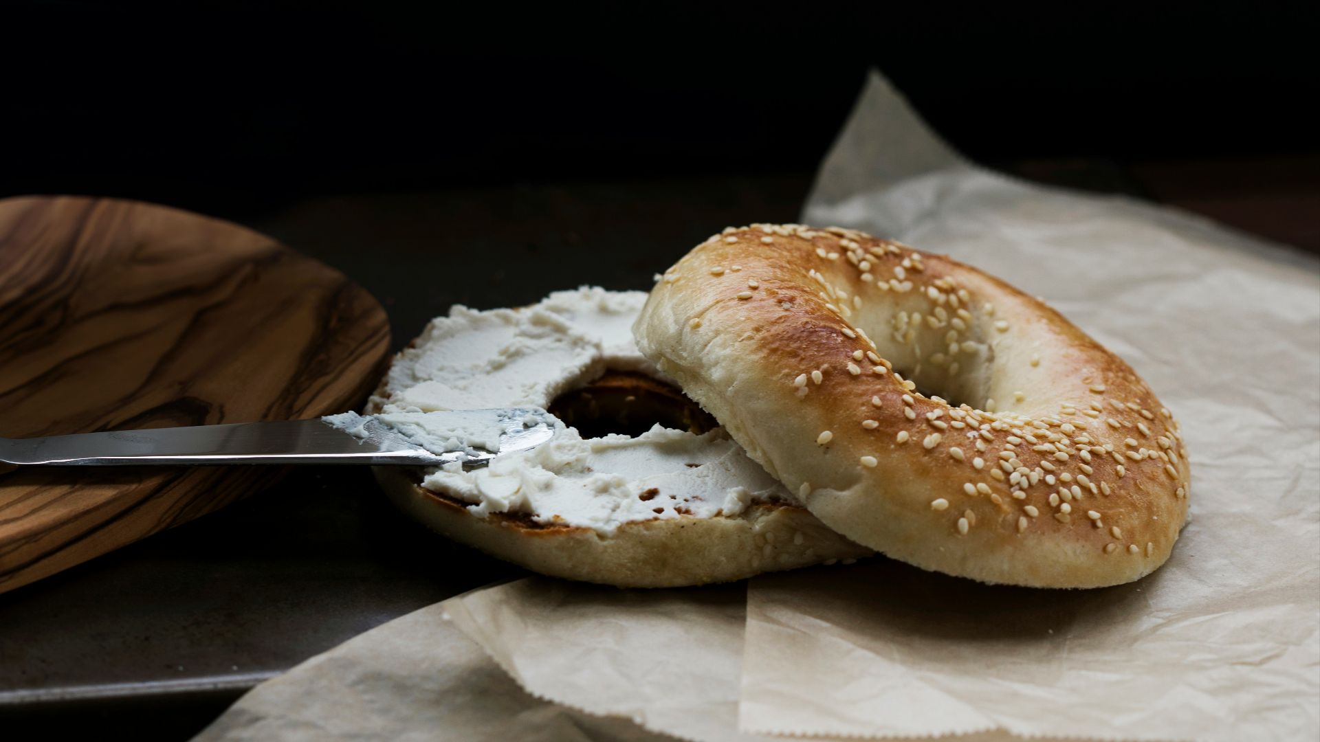 a bagel with a bite taken out of it