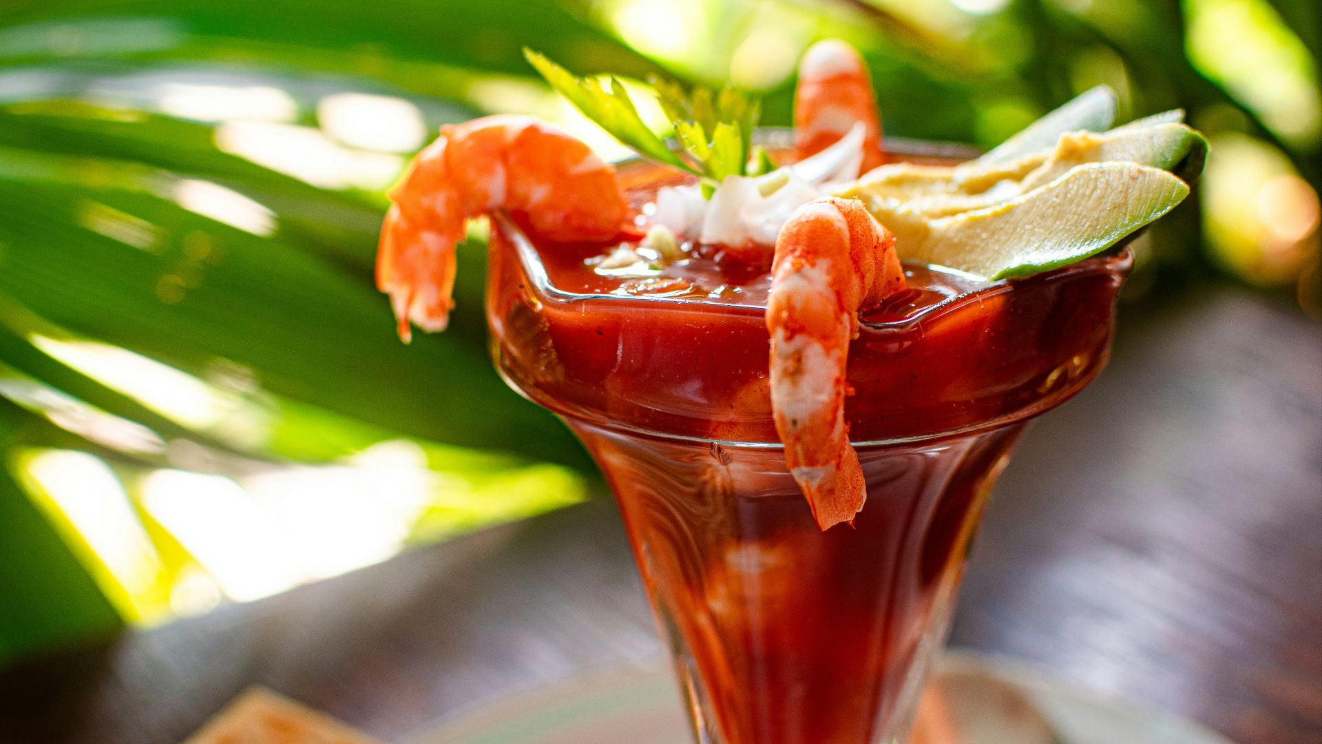 clear drinking glass with red liquid