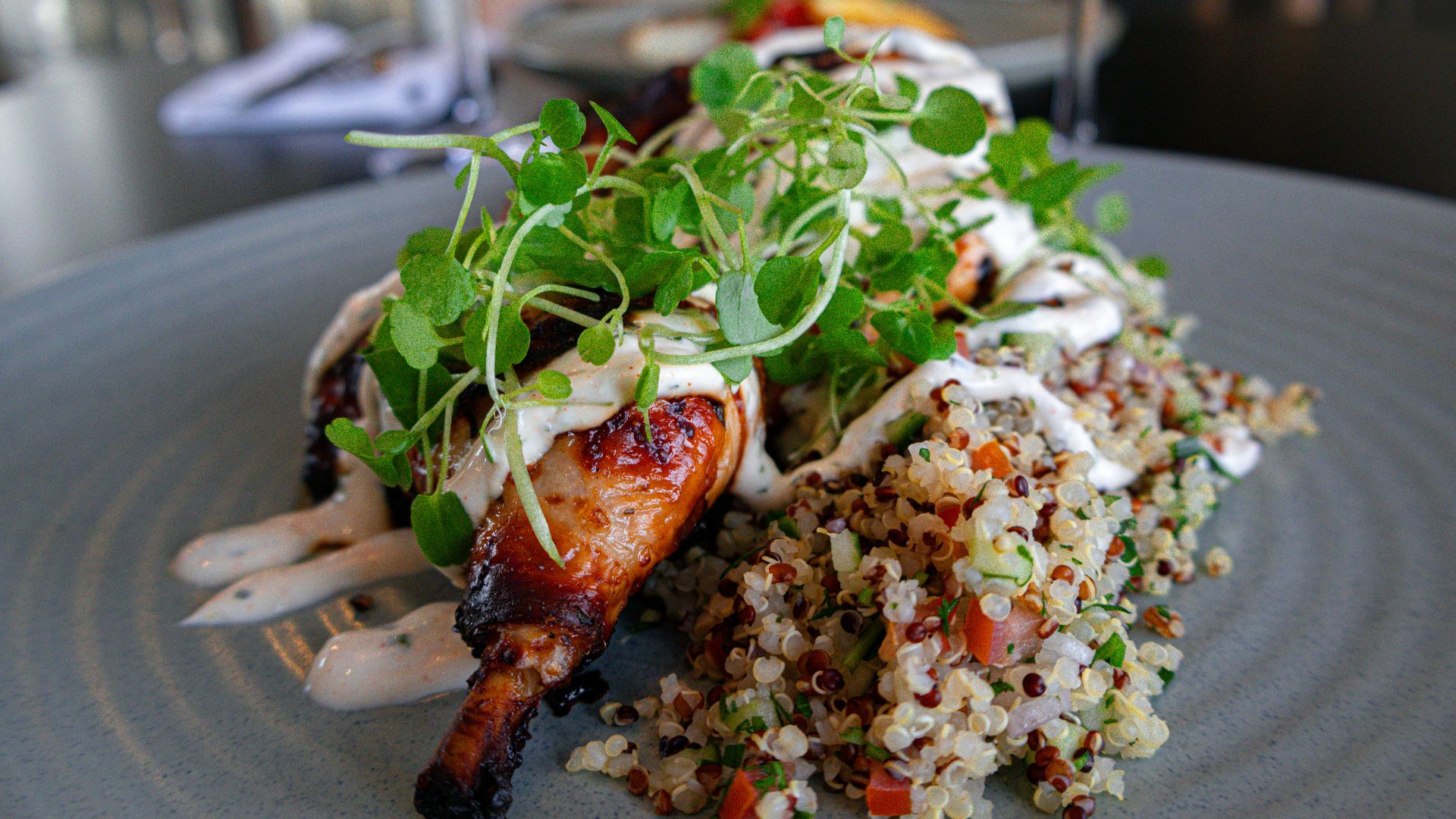 A plate of food with meat and vegetables on it