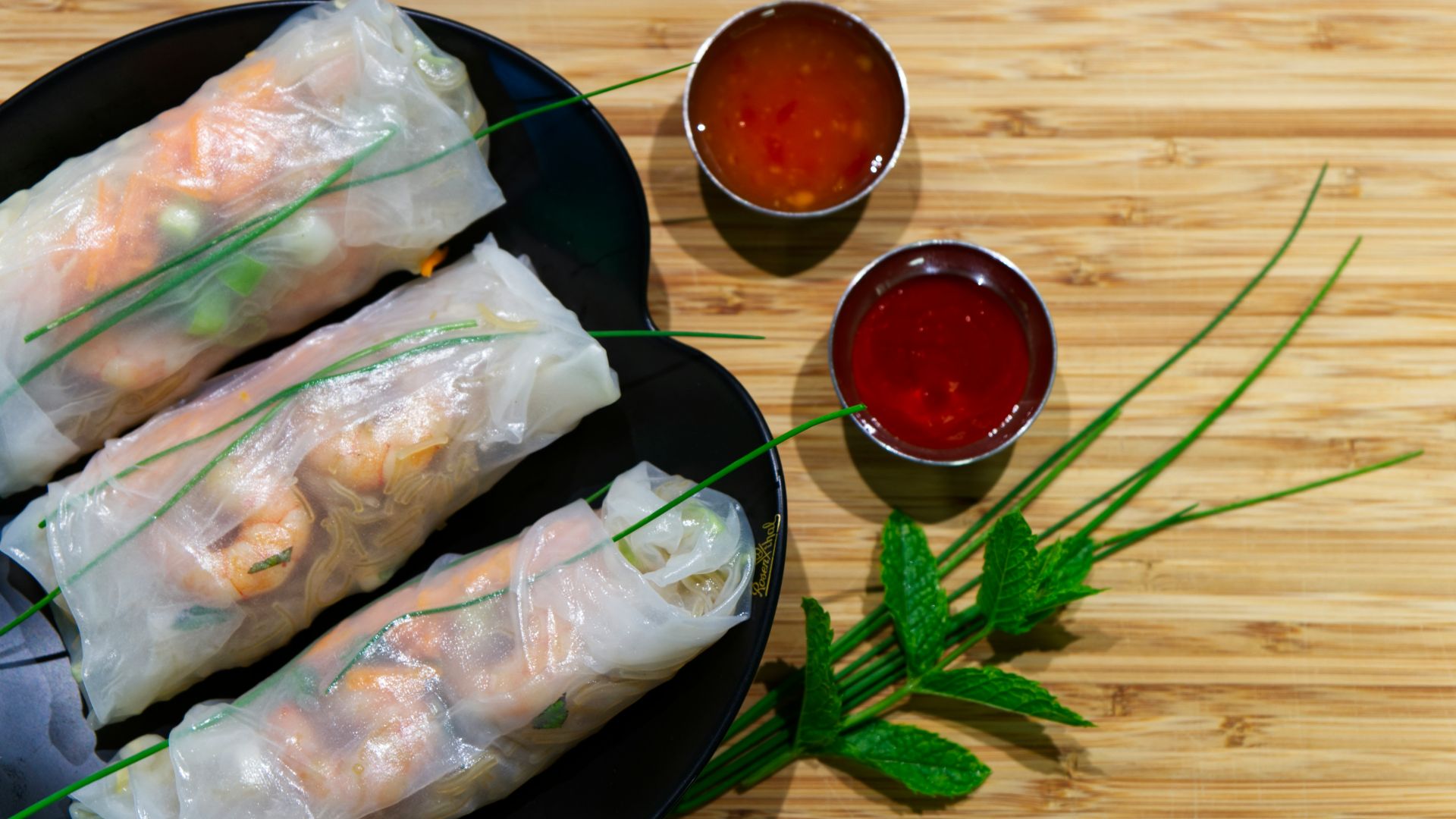 raw fish meat on black plate