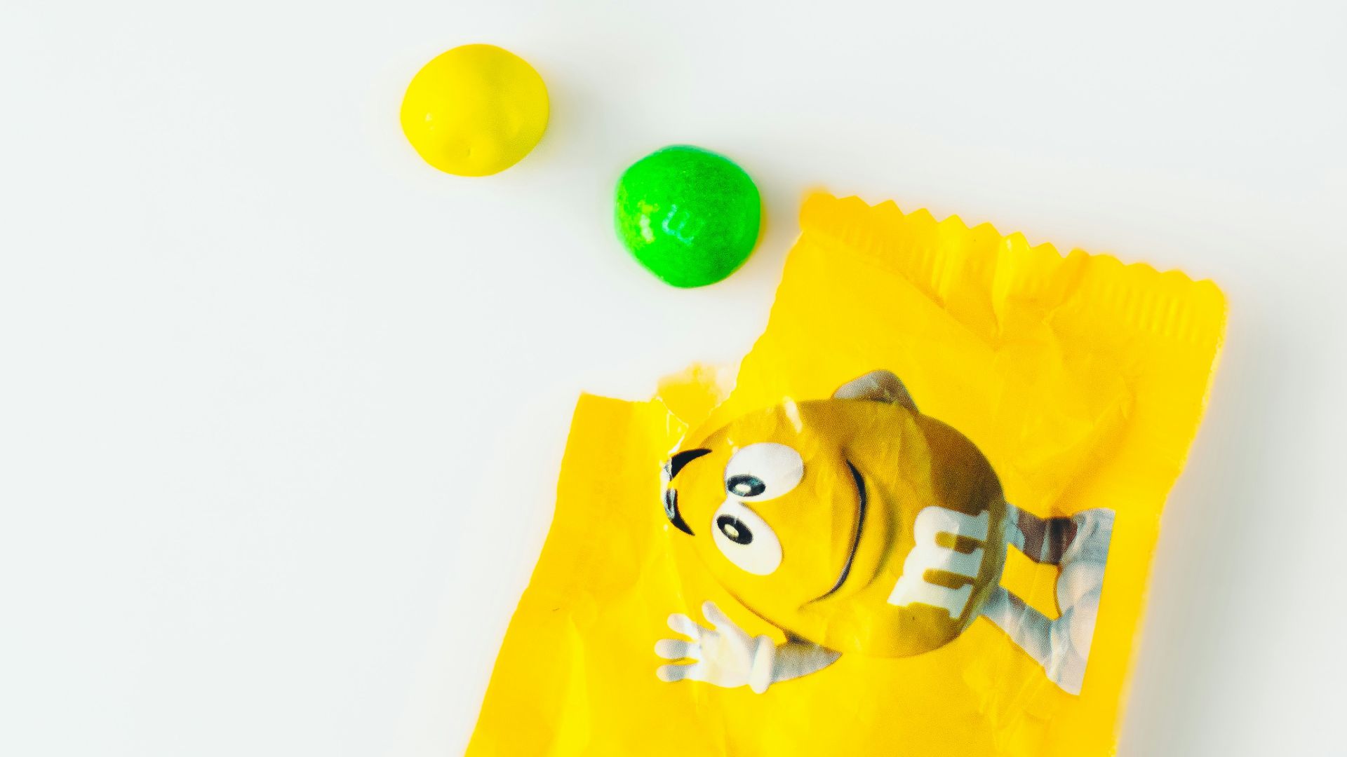 a bag of candy sitting on top of a white table