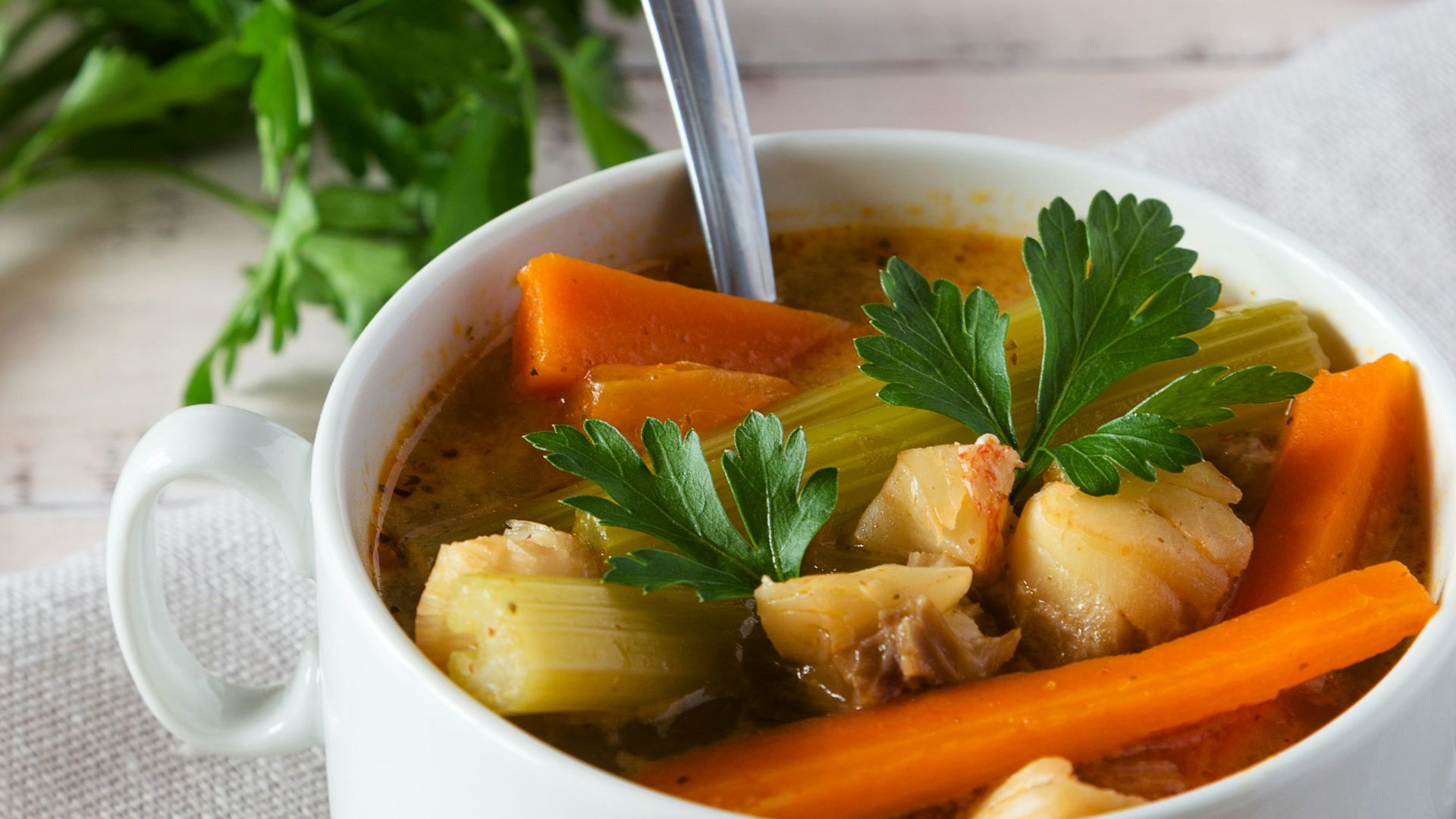 Delicious, hearty vegetable soup with carrots and herbs.