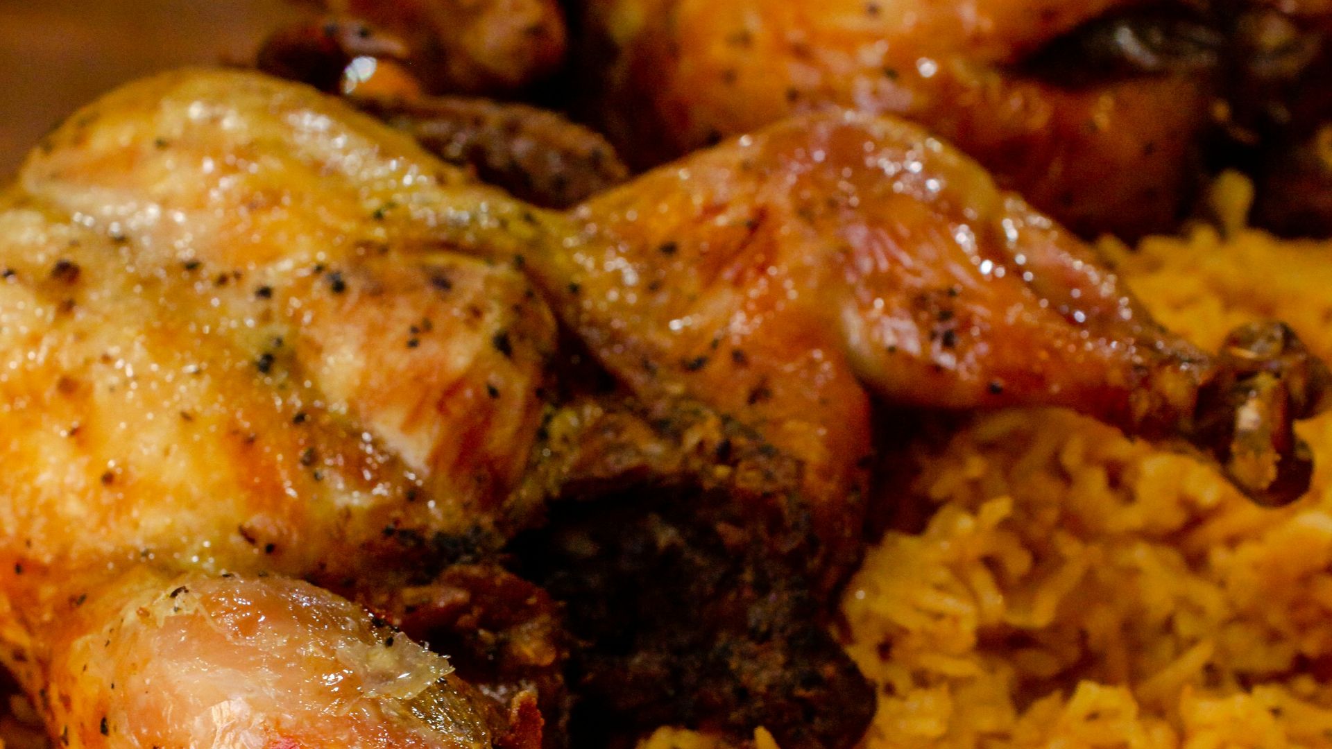 fried chicken on yellow rice