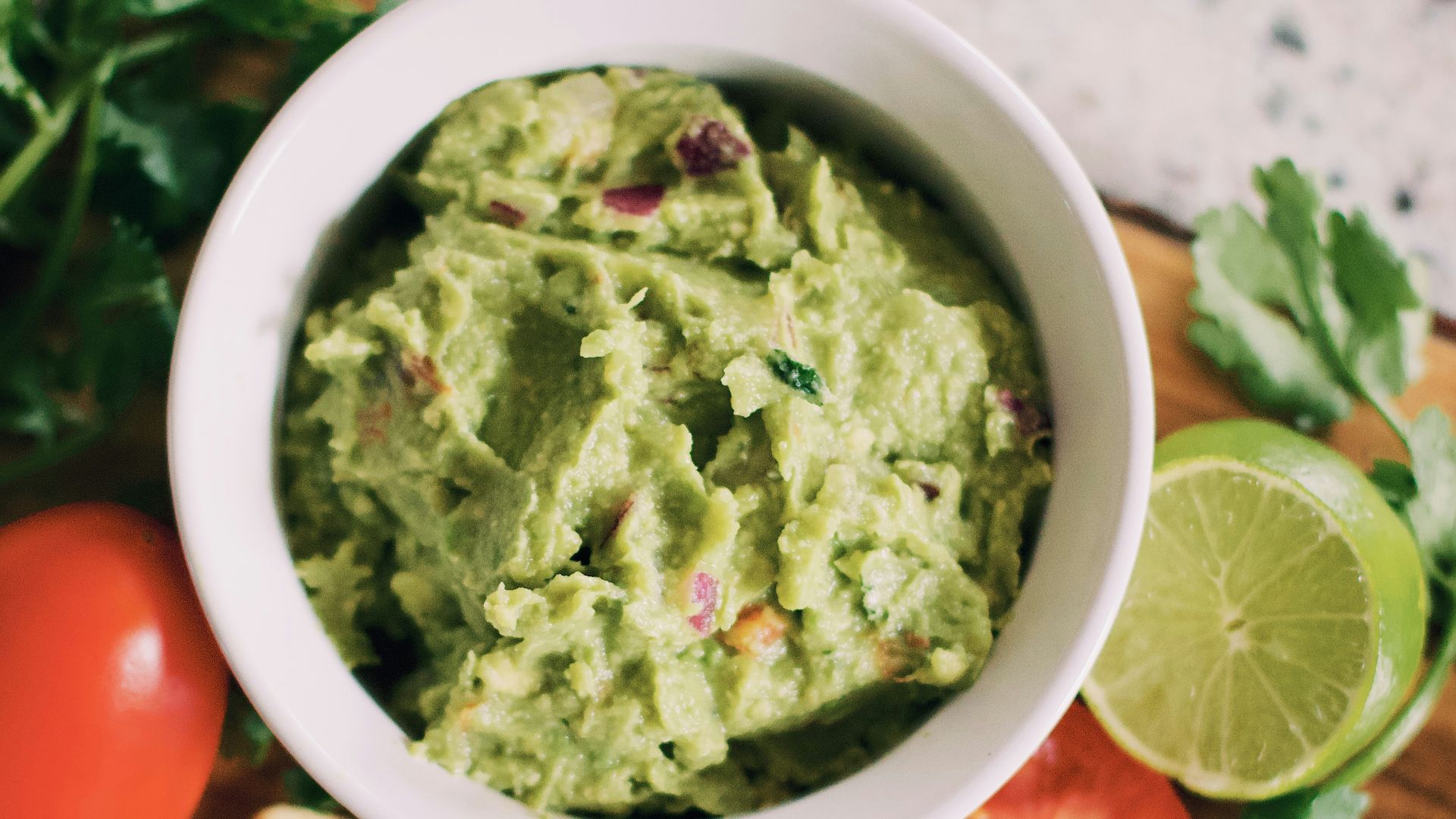 green soup in white ceramic bowl