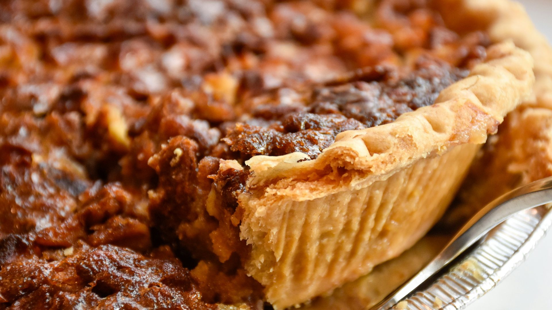 brown pie on white ceramic plate