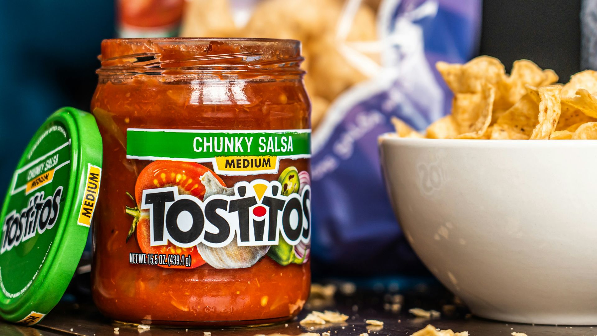 green and brown labeled jar