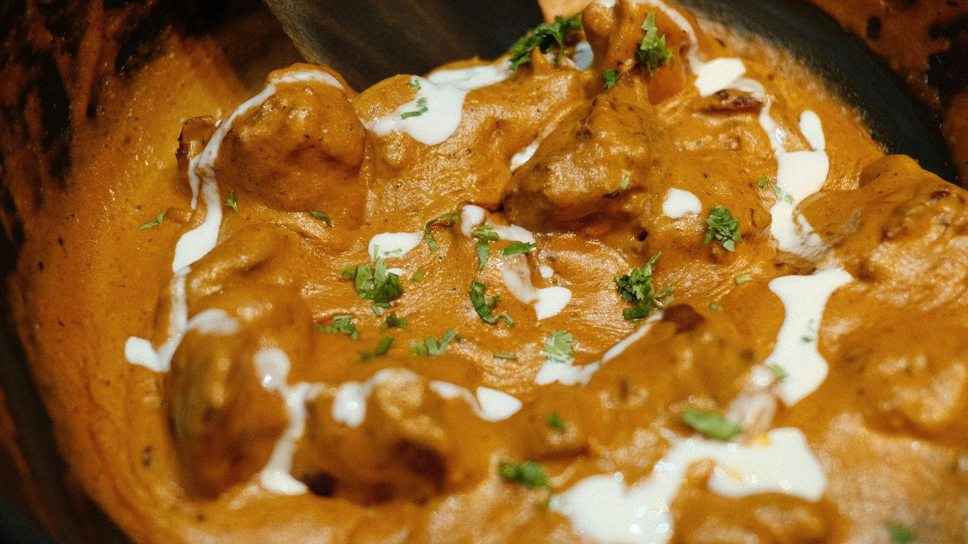brown and green dish on brown wooden bowl