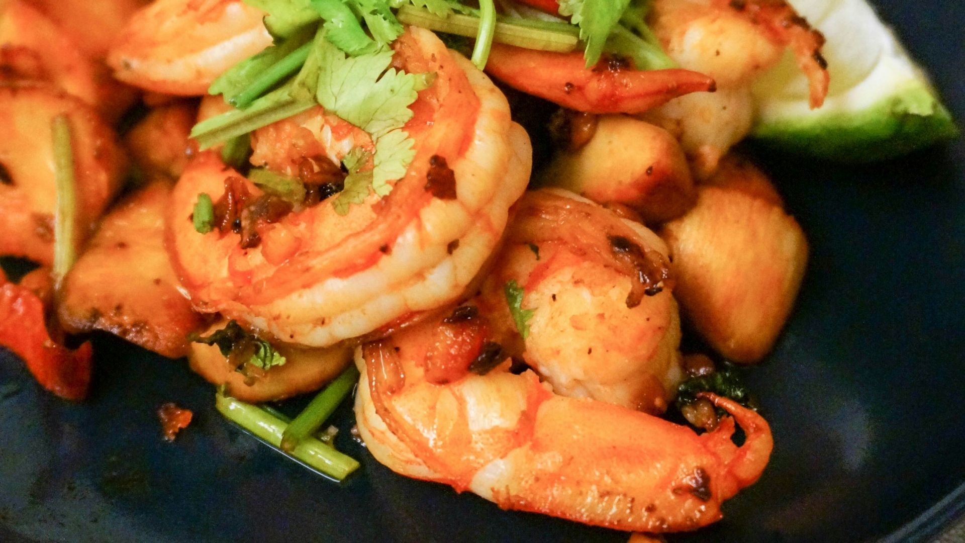cooked shrimps on blue ceramic plate