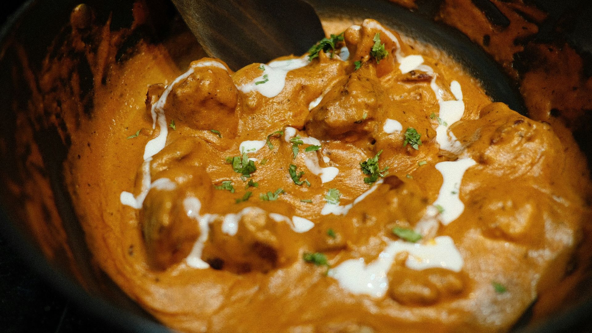 brown and green dish on brown wooden bowl