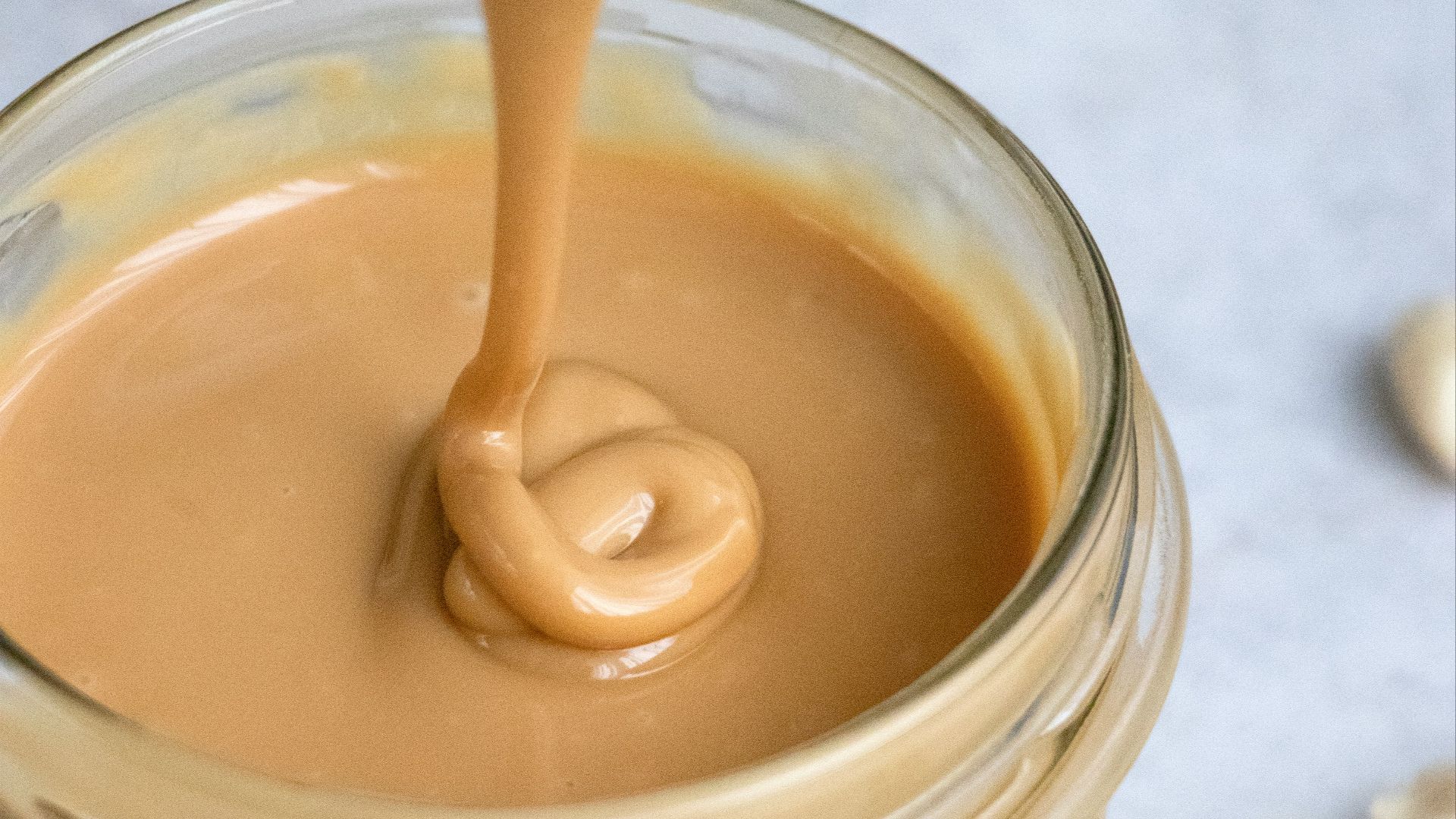 clear glass jar with brown liquid