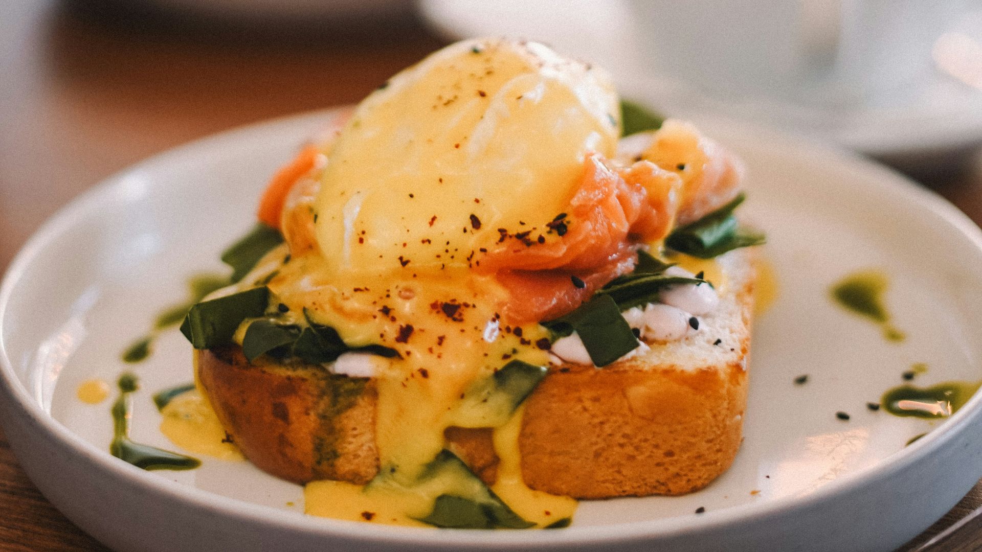 A plate of food on a wooden table