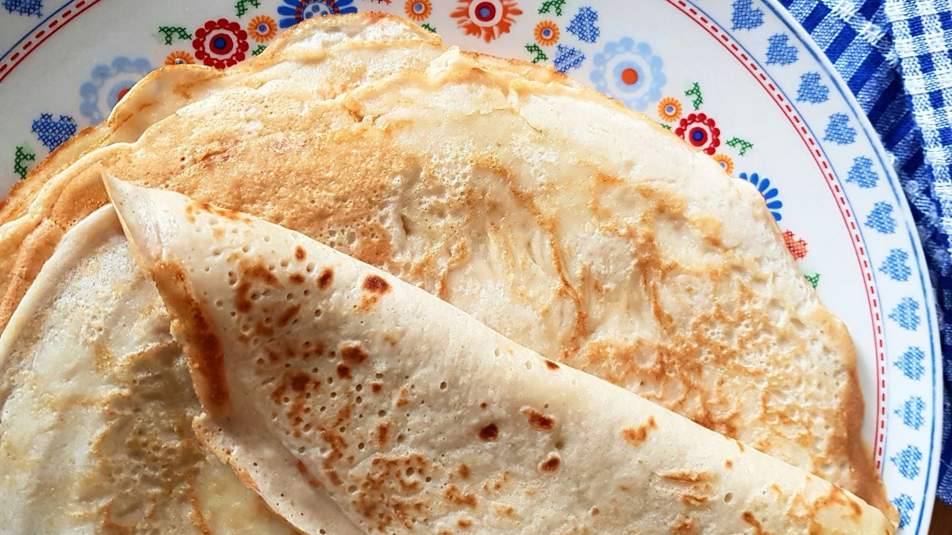 white and blue ceramic plate