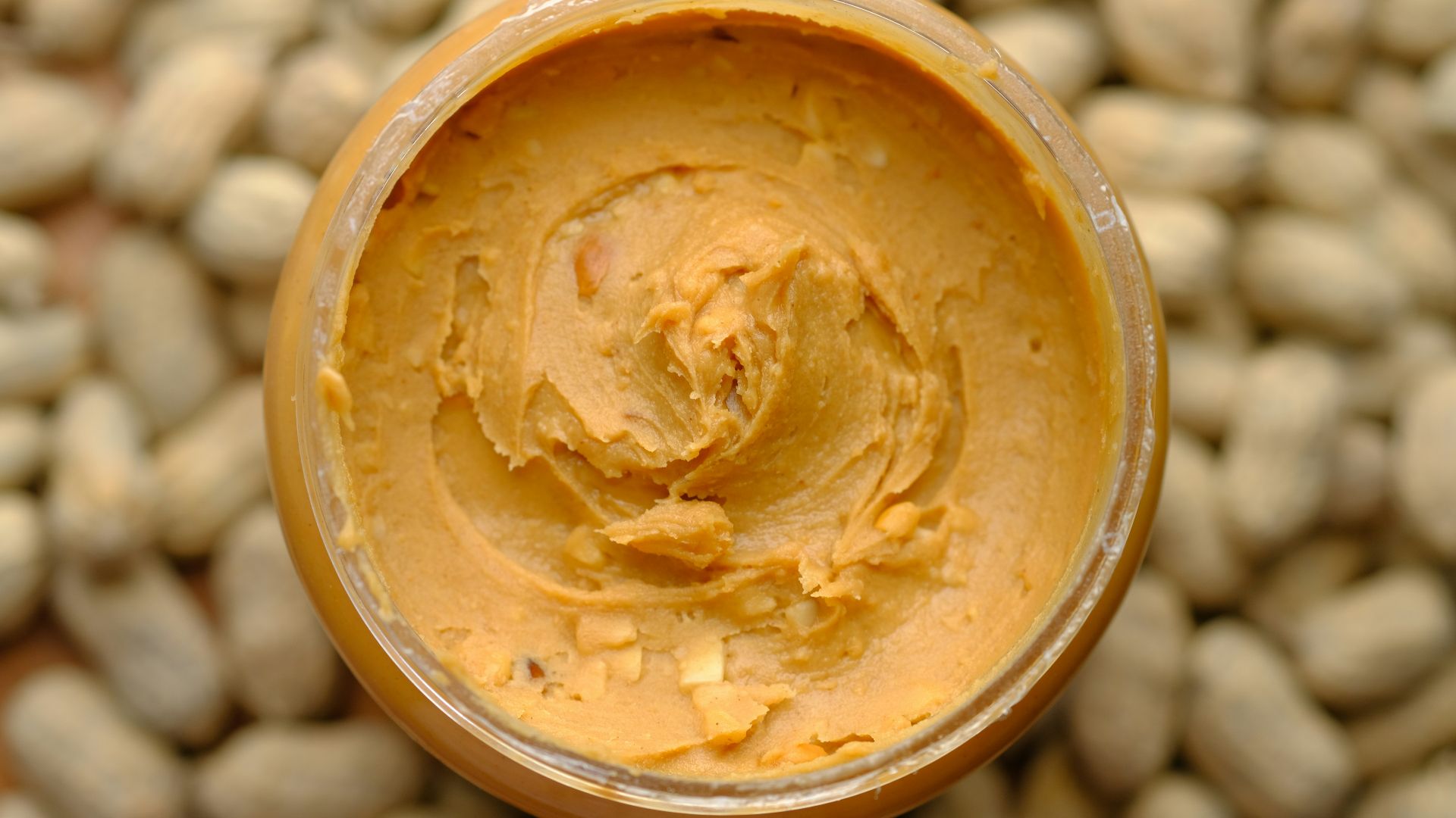 brown powder in brown round container