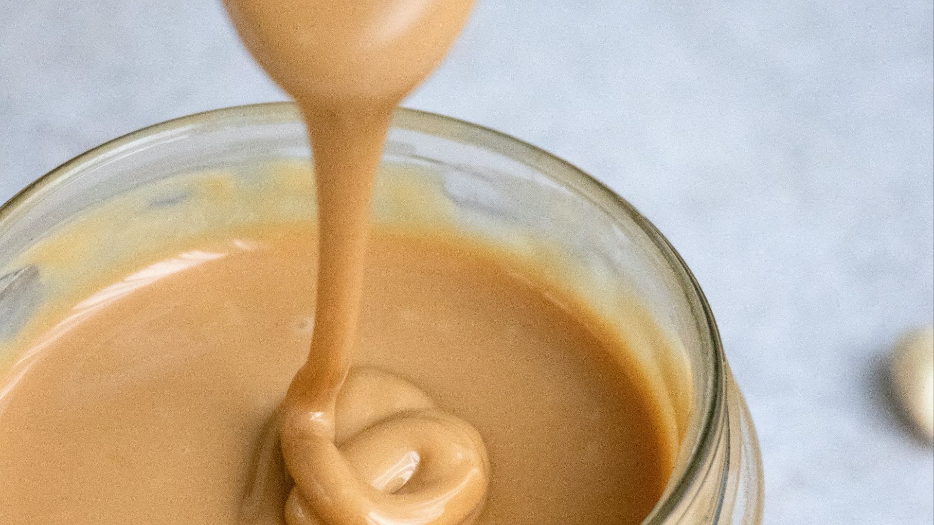 clear glass jar with brown liquid