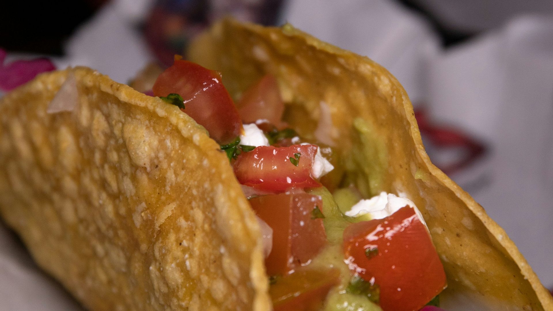 a close up of a taco on a plate
