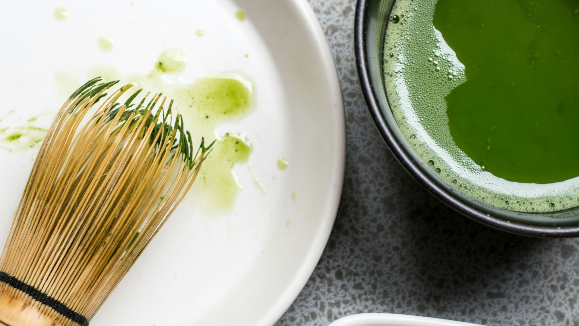 green powder in white bowl
