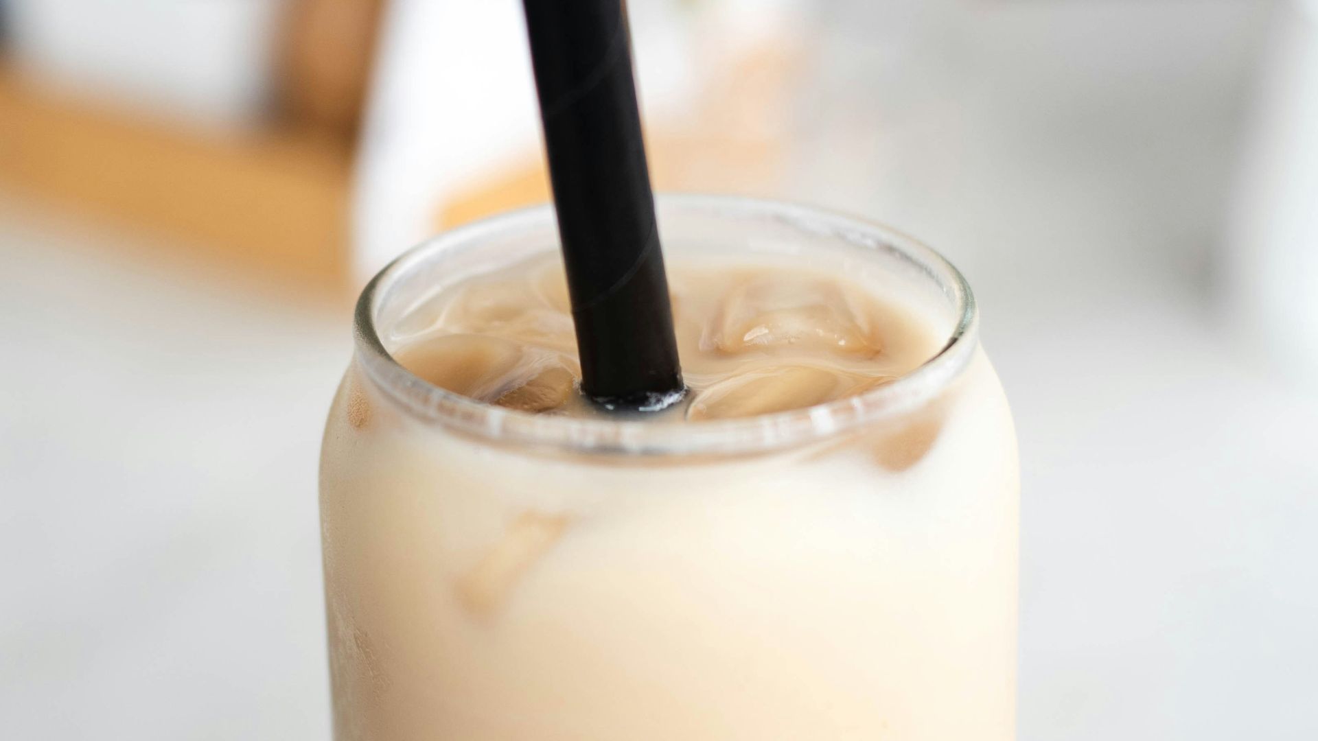 clear drinking glass with white liquid