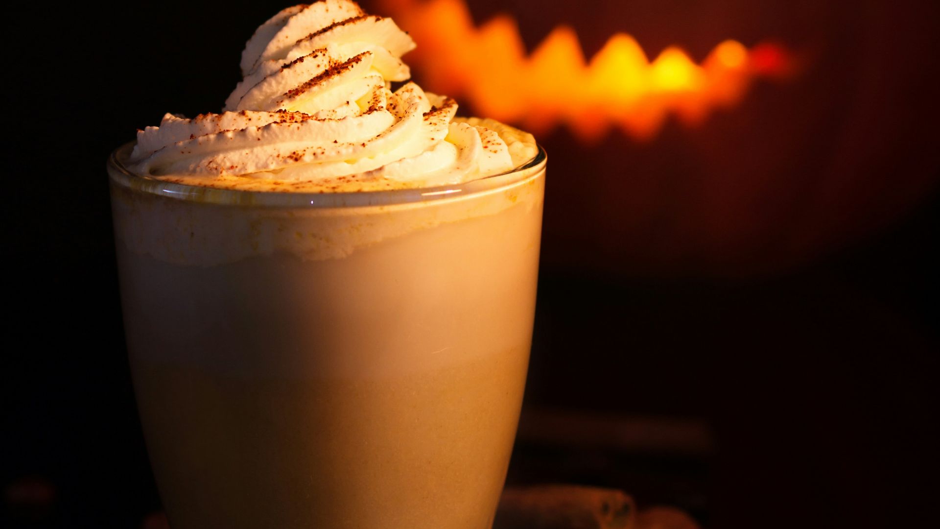 white and brown cupcake with jack o lantern