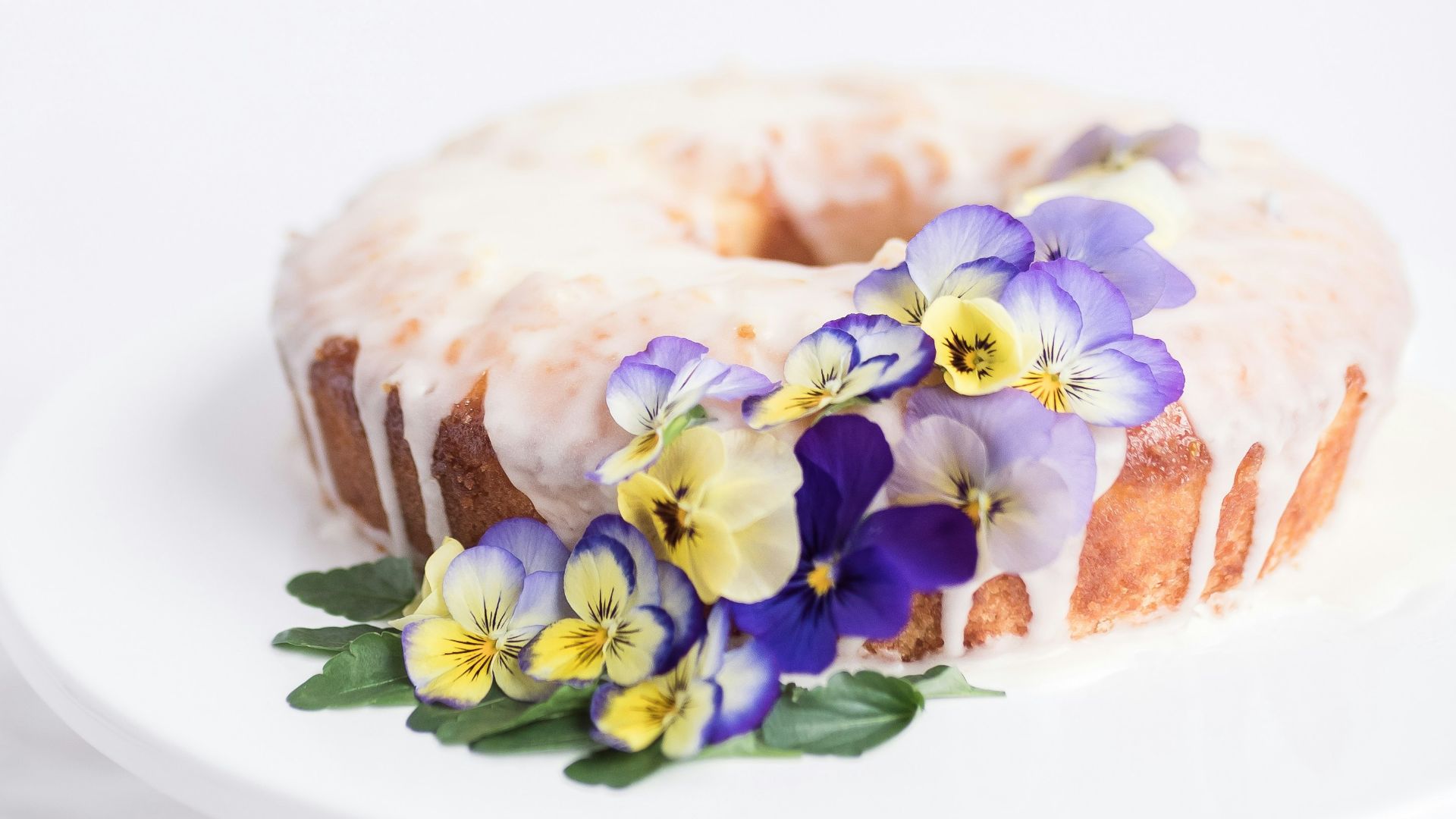 one layer cake with purple orchi flowers