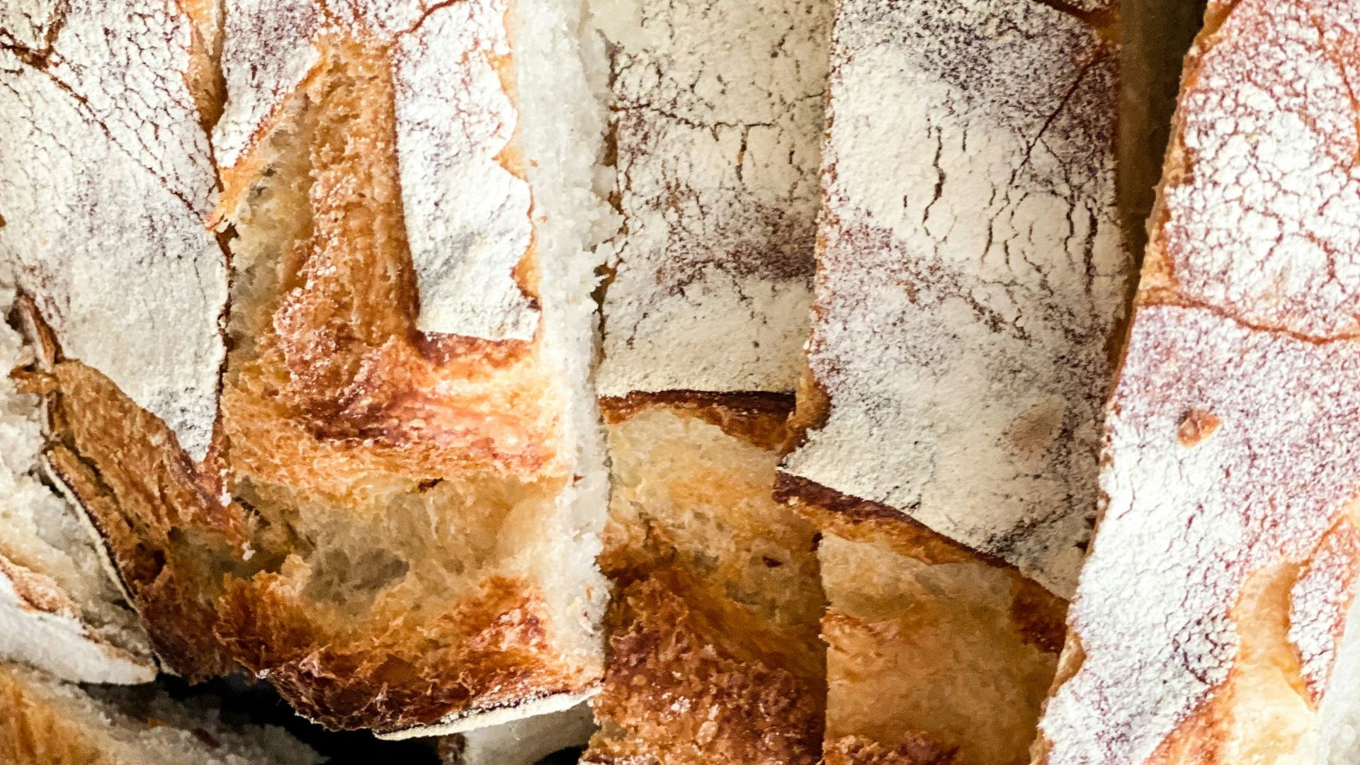 brown bread on white and black textile