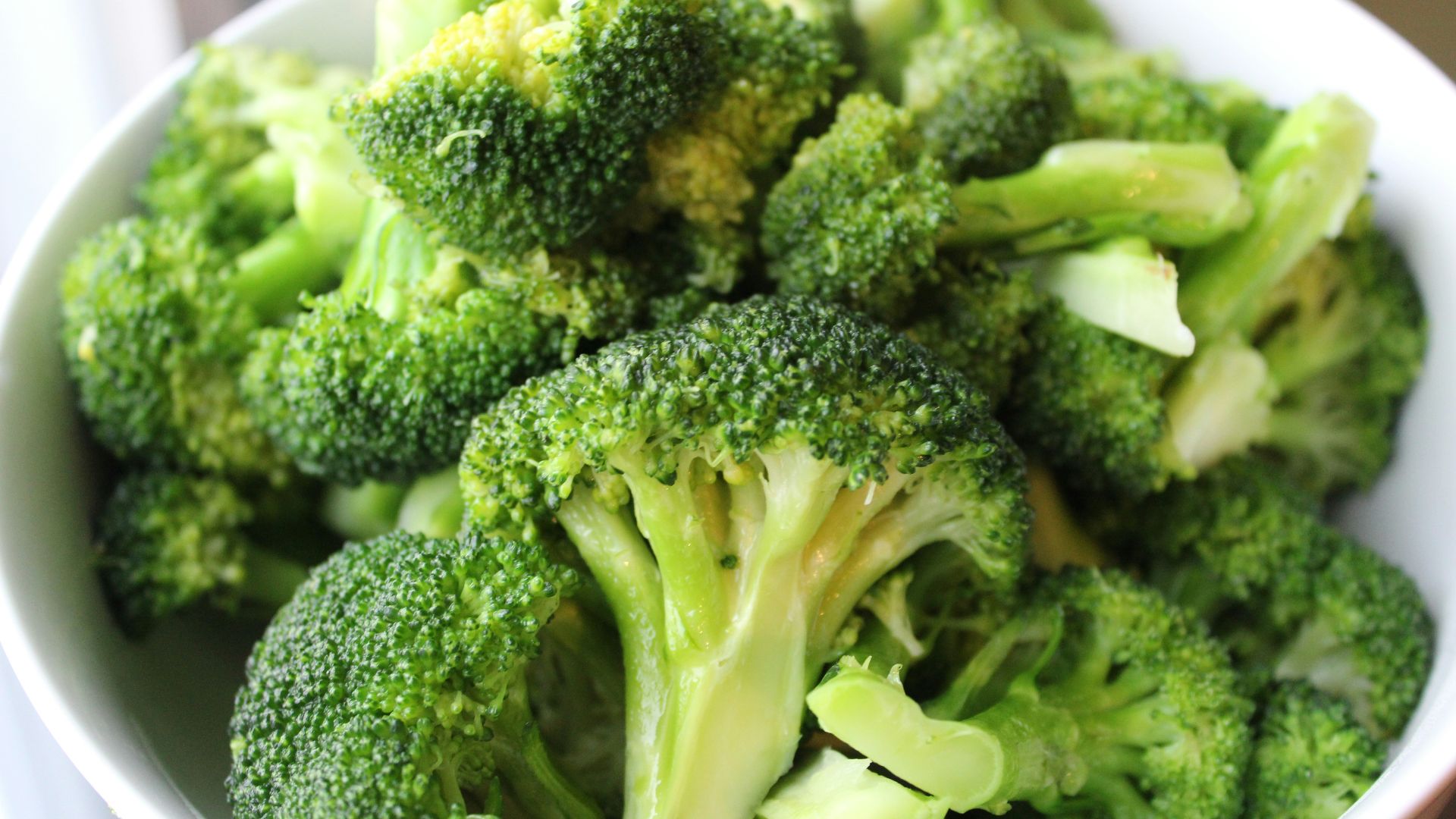 green broccoli on white ceramic plate
