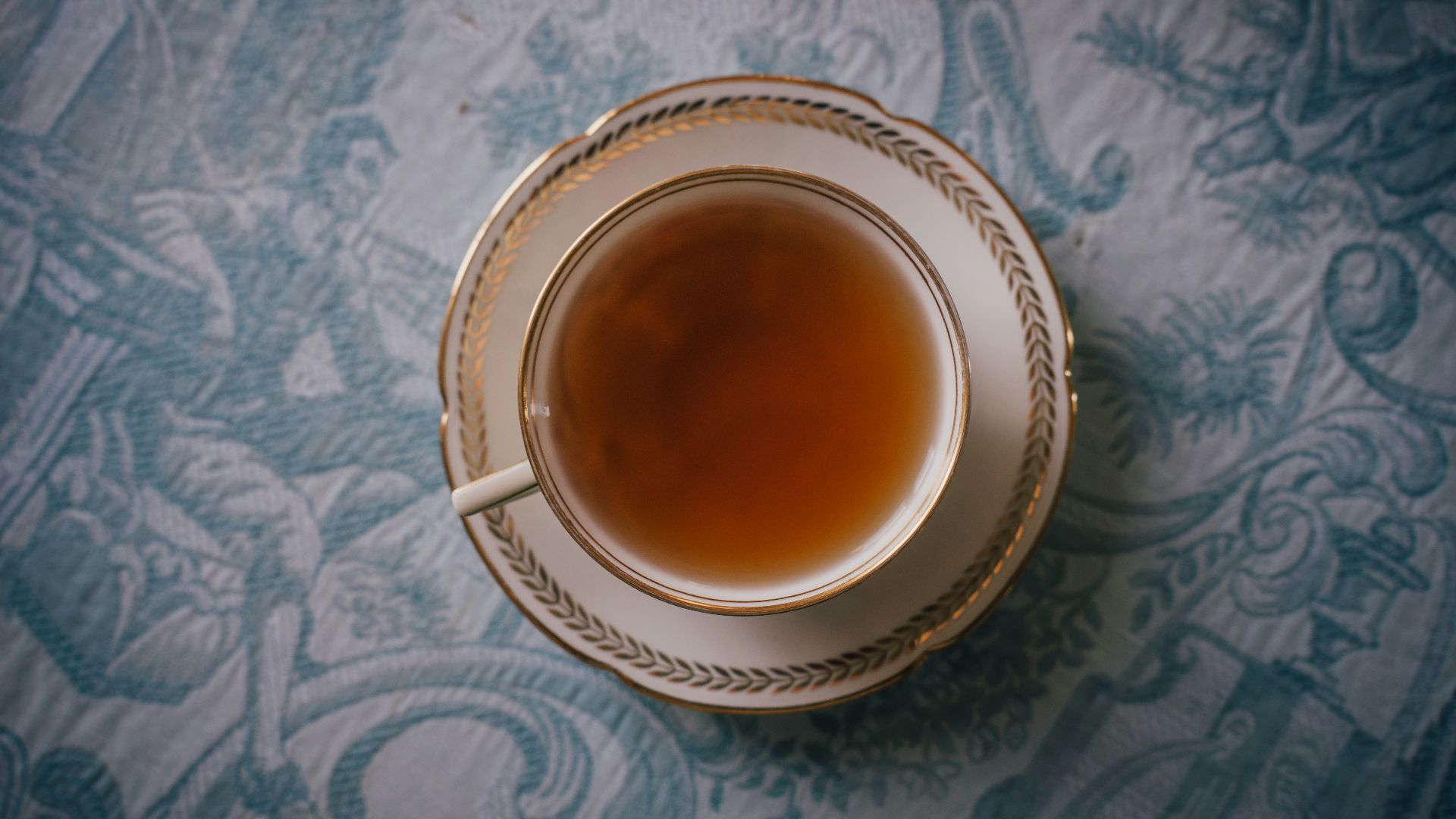 a cup of tea sitting on top of a table