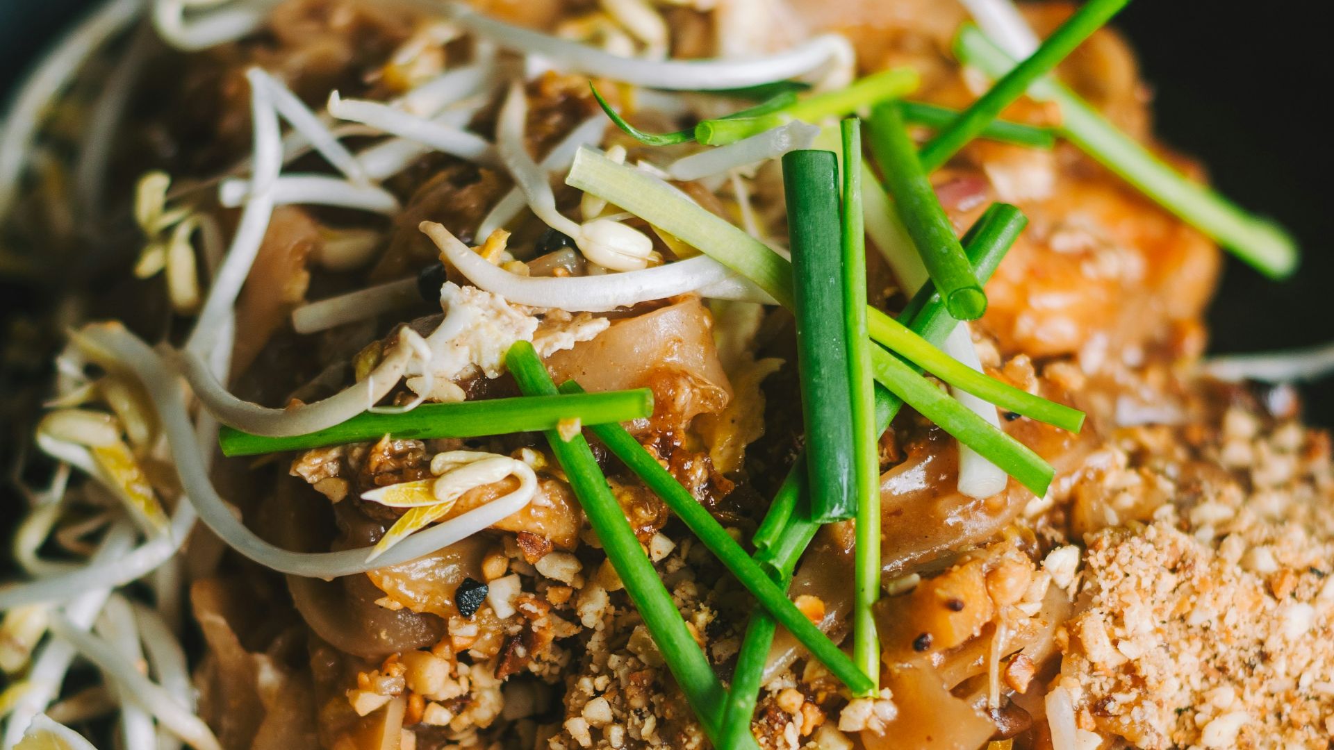 a plate of food on a wooden table