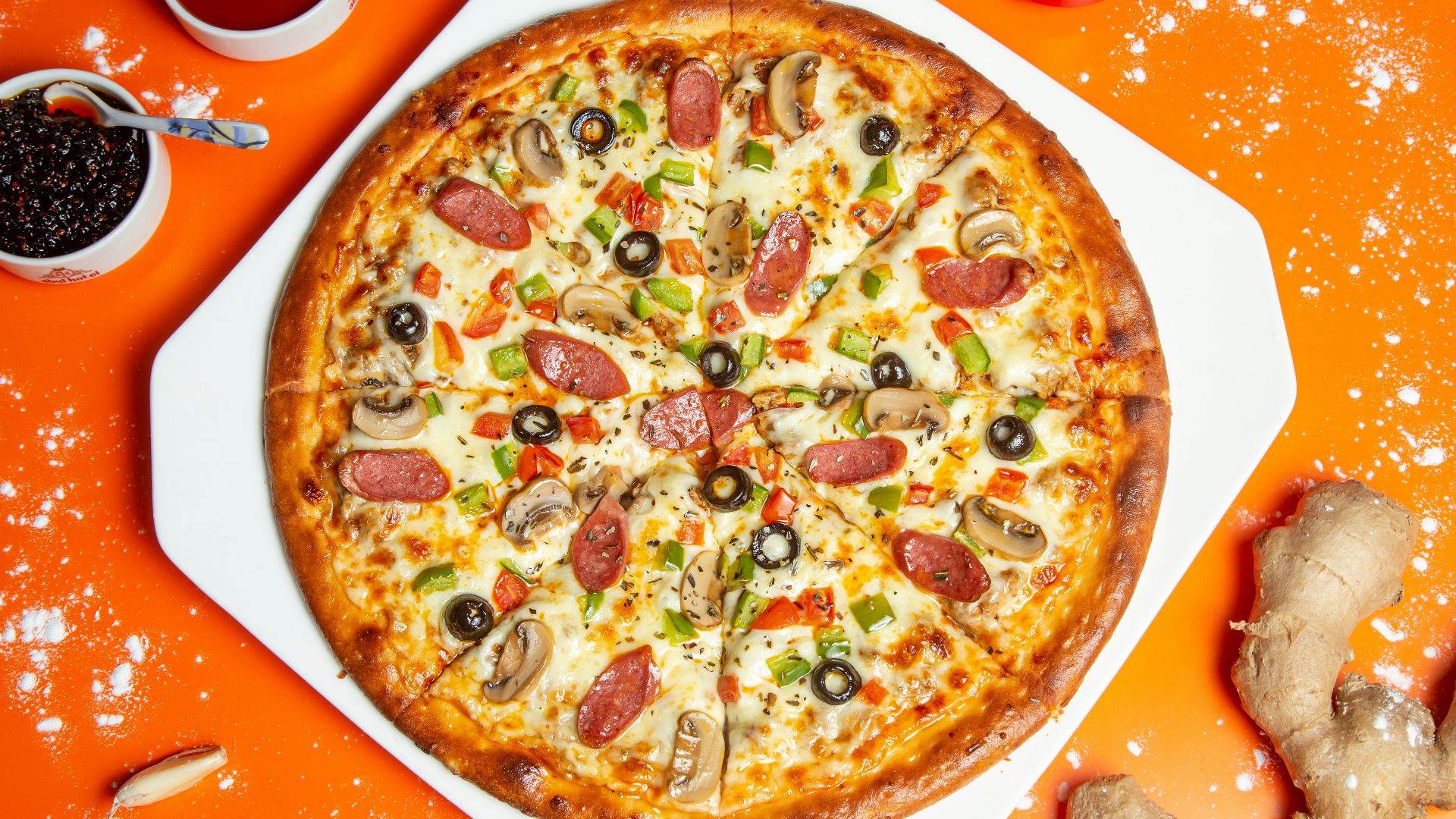 pizza with cheese and green leaf