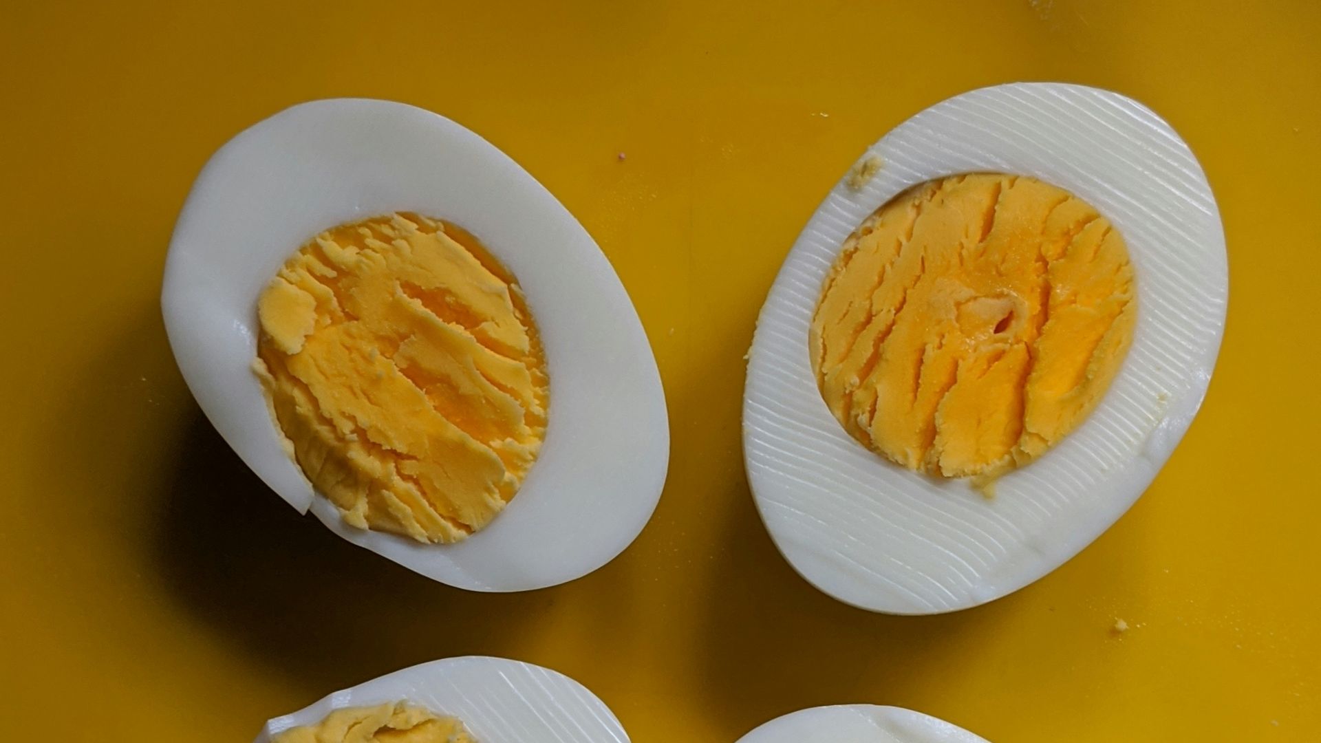 two sliced boiled eggs