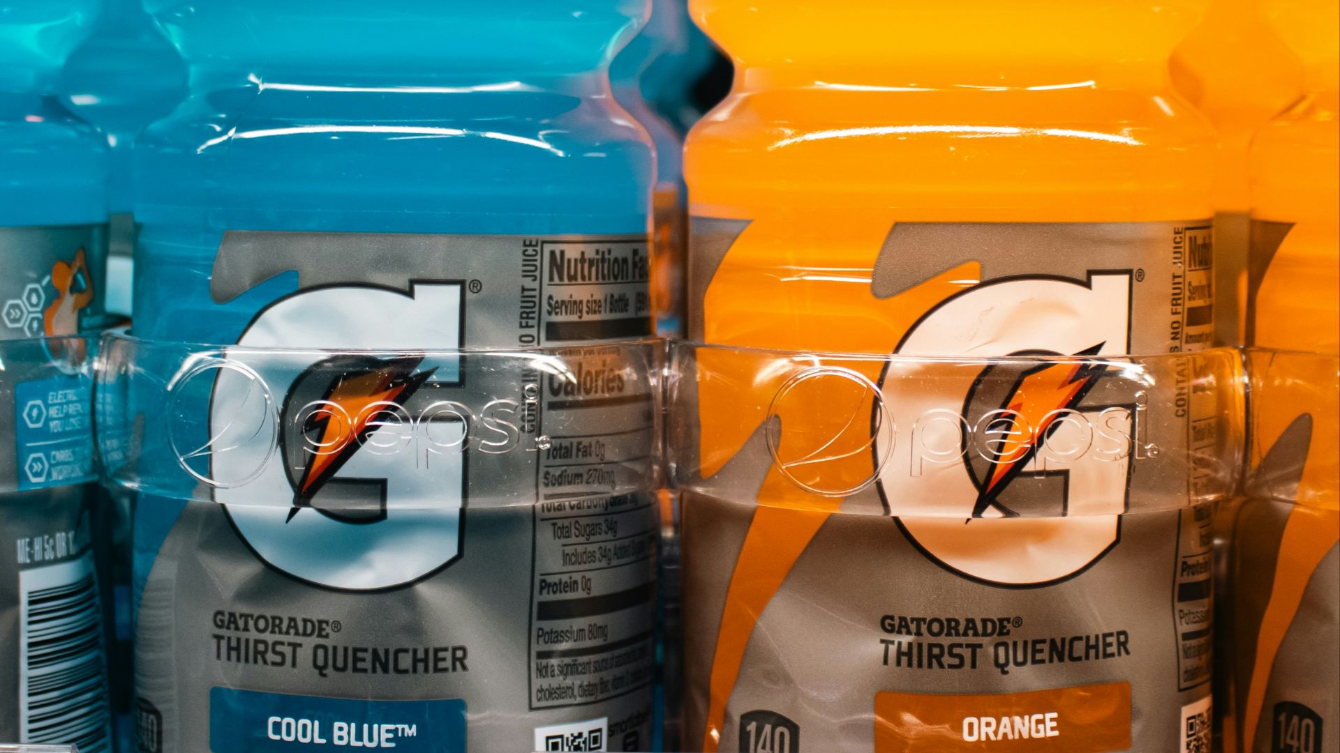 Gatorade bottles are displayed on a store shelf.